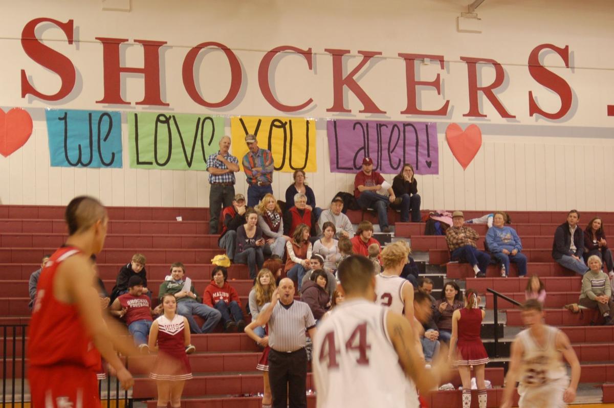 Shocker girls sit game out in memory of classmate