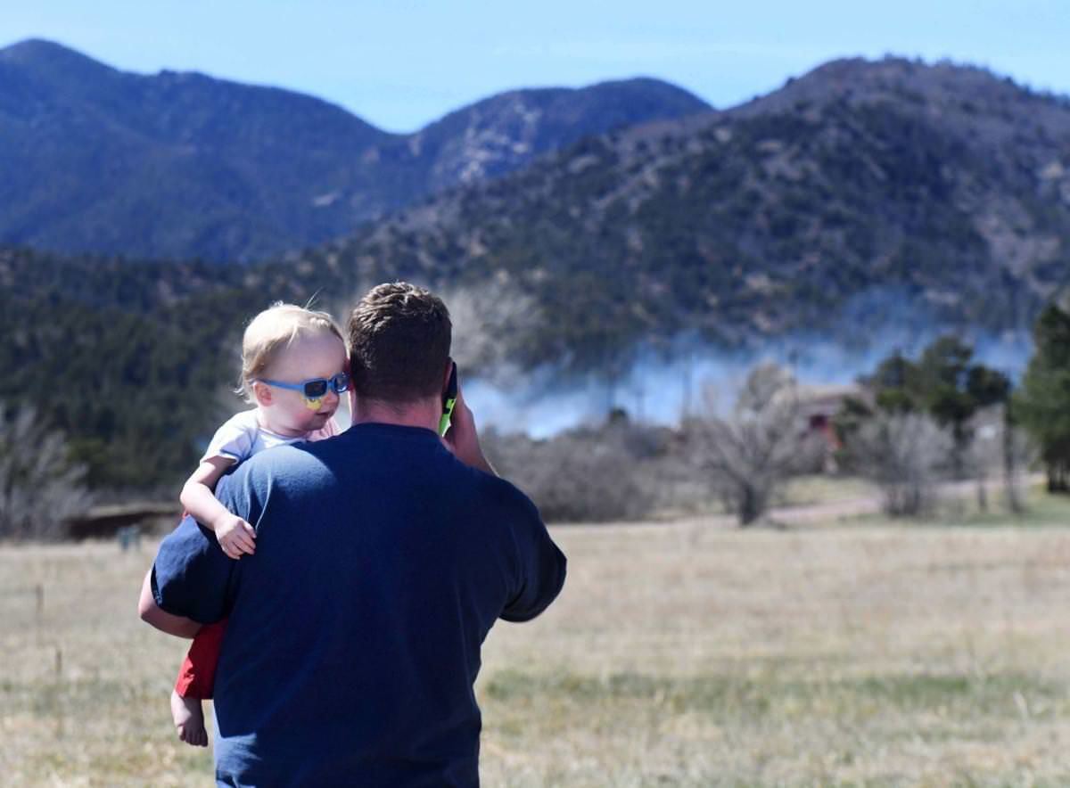 Homes evacuated in Colorado as firefighters battle blaze