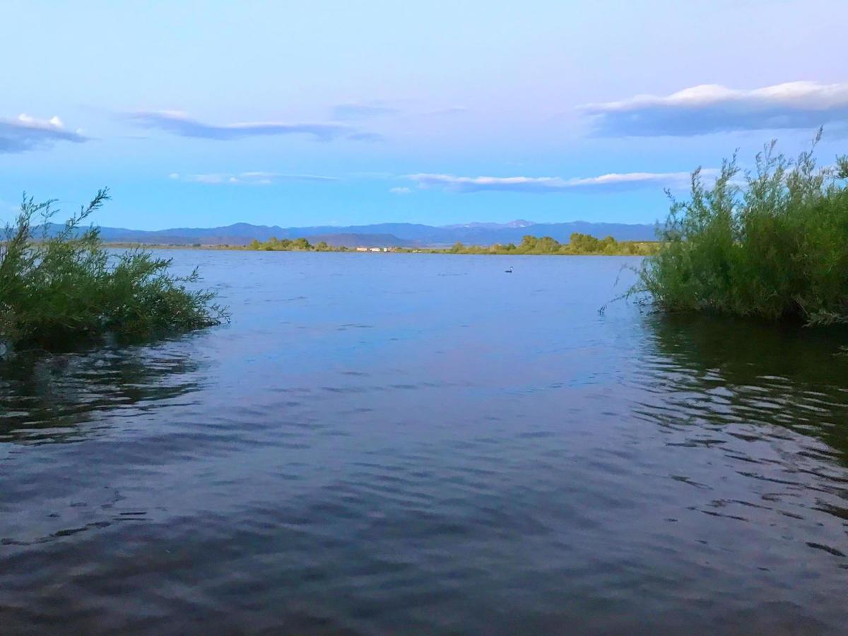 The hidden reservoir with a backdrop of mountains near the Great Sand Dunes