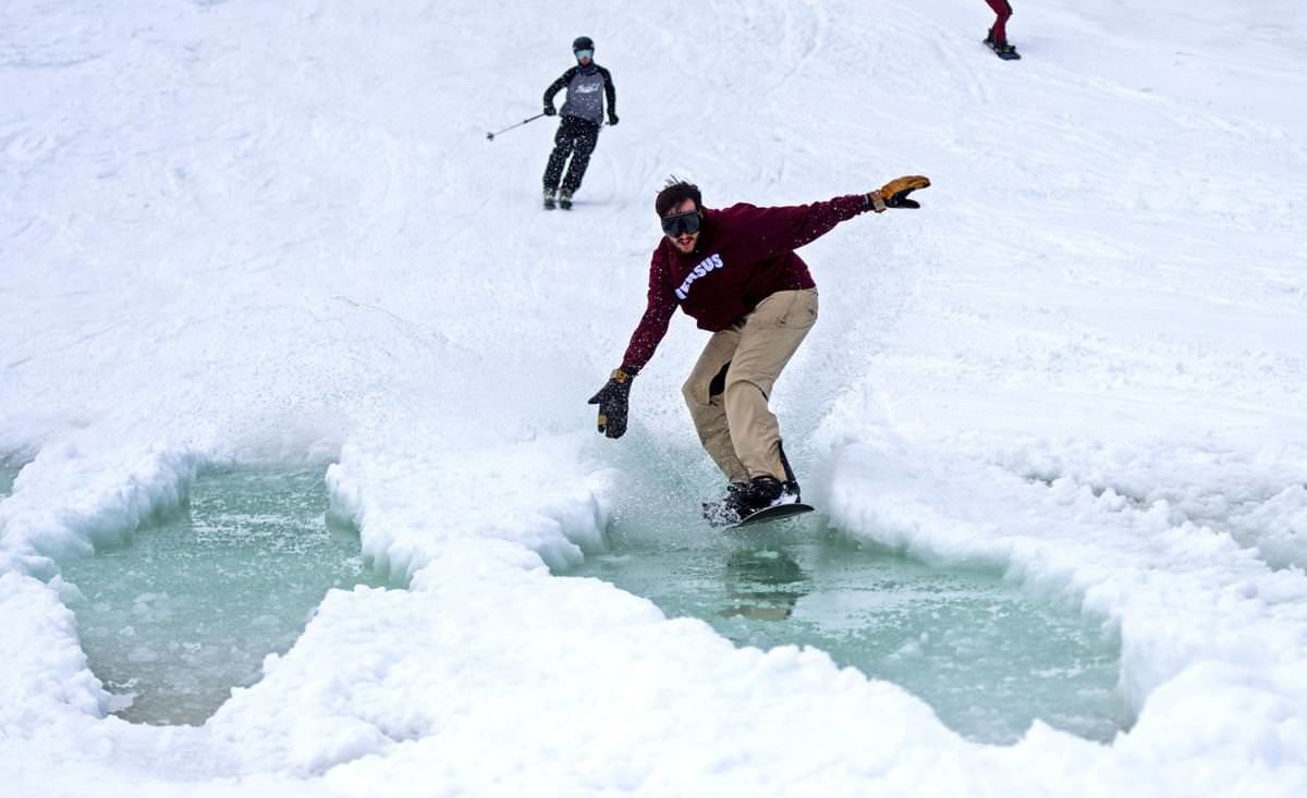 Natural pond lets slope-goers waterski at 11,500+ feet in Colorado
