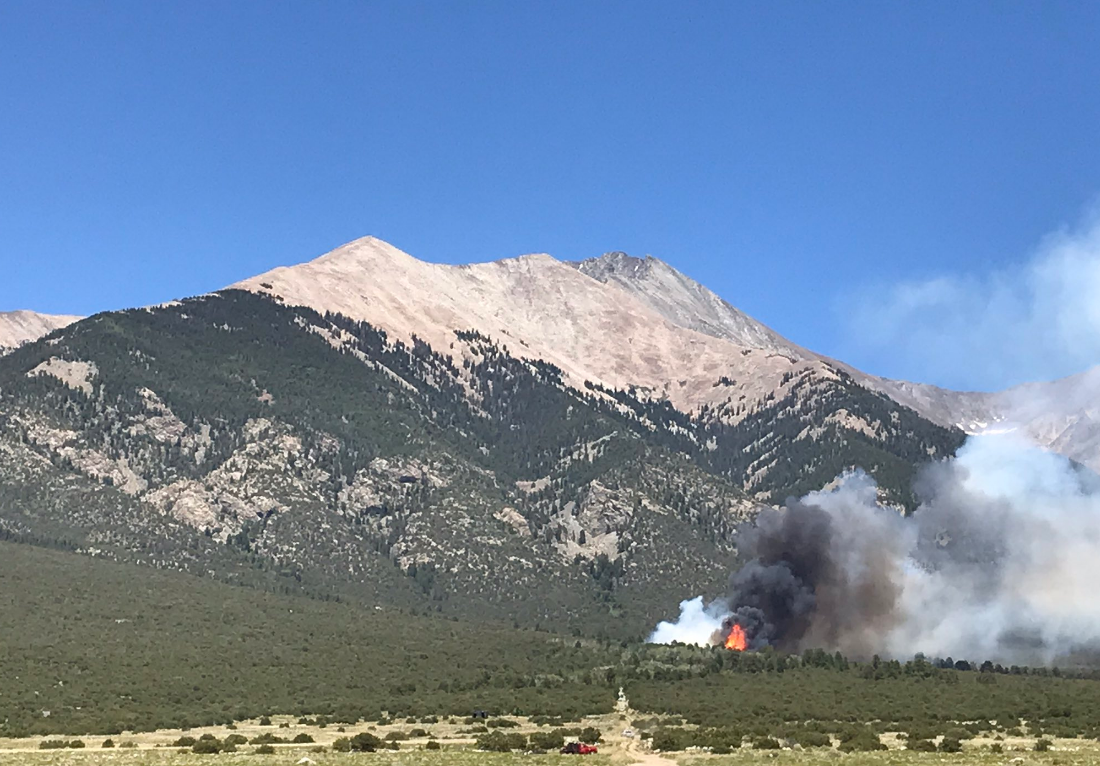 Fire burning on 14er outside Great Sand Dunes National Park