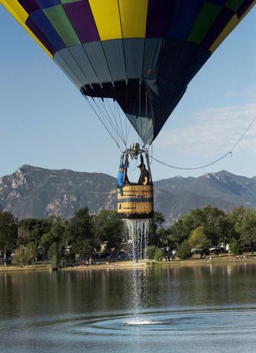 Hot-air balloonist penalized for touching down in Colorado lake with toxic algae