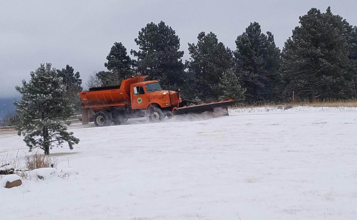 Power outages and highway closures affecting thousands as snow storm rolls into Colorado