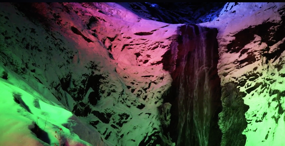Colorado waterfall illuminated with multi-colored winter lights