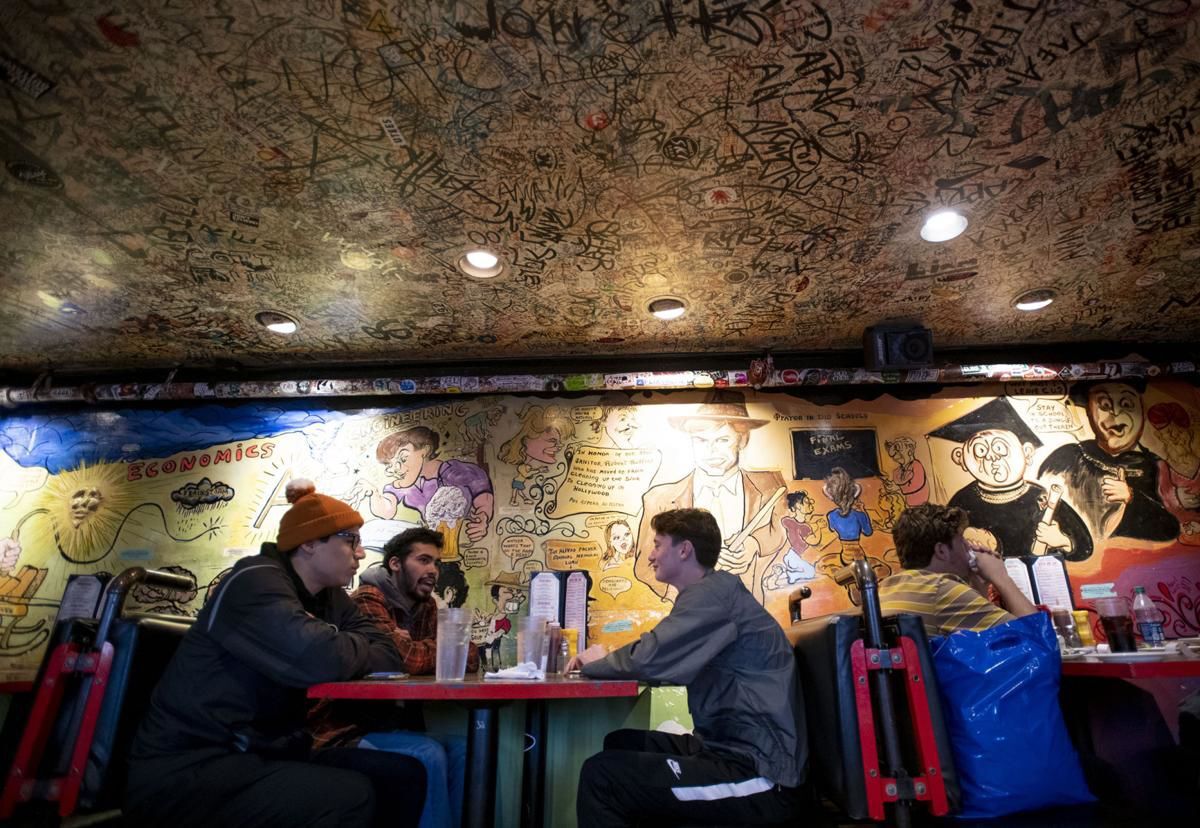 Decades of graffiti decorate walls of iconic Colorado eatery