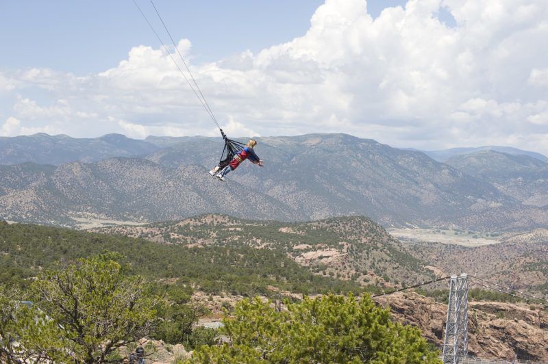 ...Or launch yourself above the Royal Gorge on a massive canyon swing, hanging above the ground more than 1,000 feet below.Photo Credit: chapin31 (iStock).
