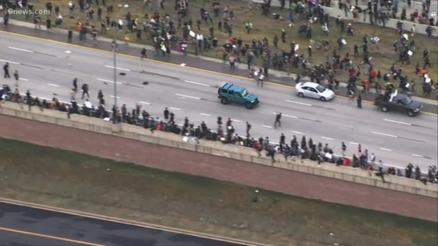 Protester shot, vehicle drives through Elijah McClain protest in Aurora