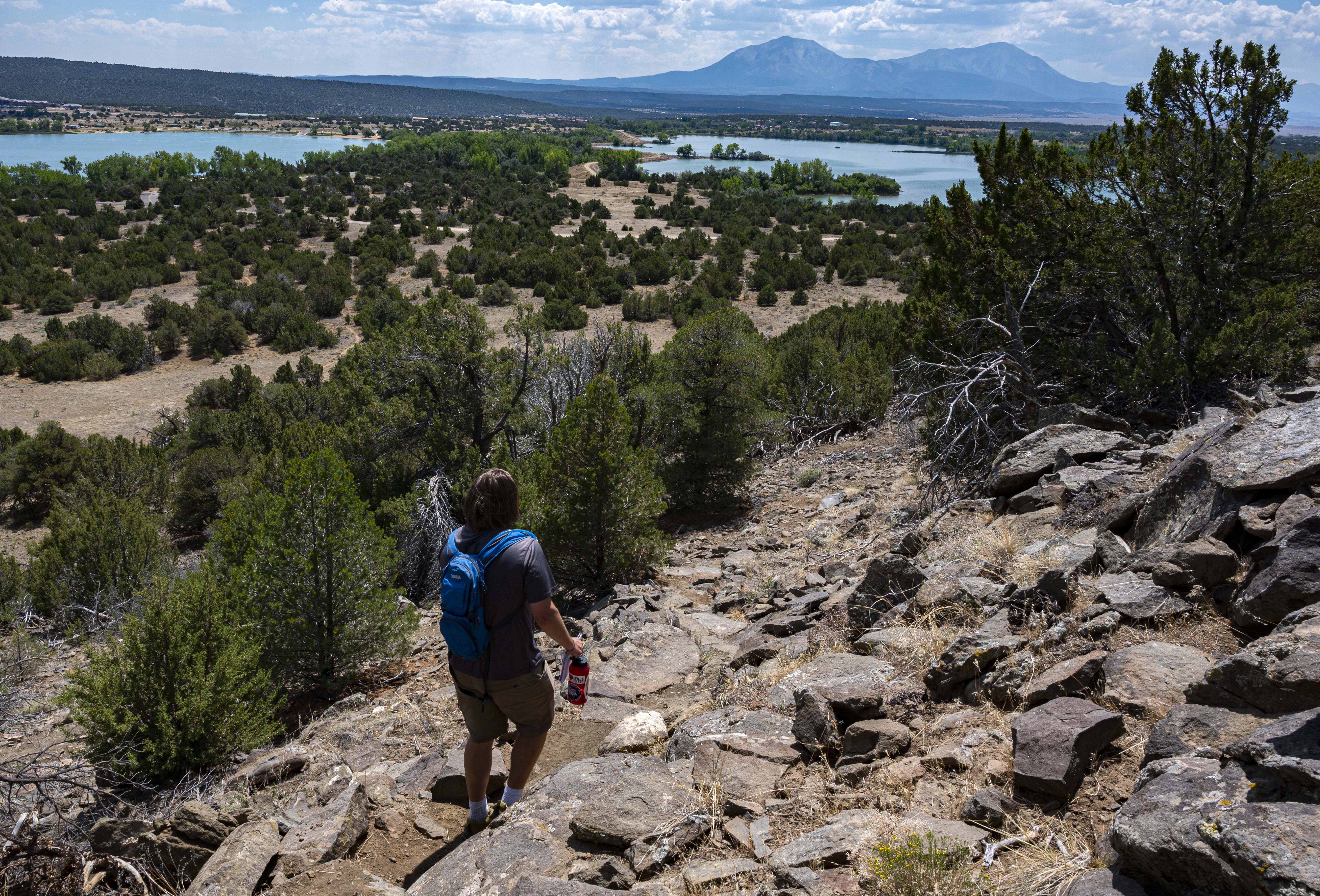 A hiker climbs down the William Henry Jackson Trail spur back to Hogback Trail Tuesday, Aug. 18, 2020, while exploring Lathrop State Park near Walsenburg, Colo. (The Gazette, Christian Murdock) (Christian Murdock/The Gazette)