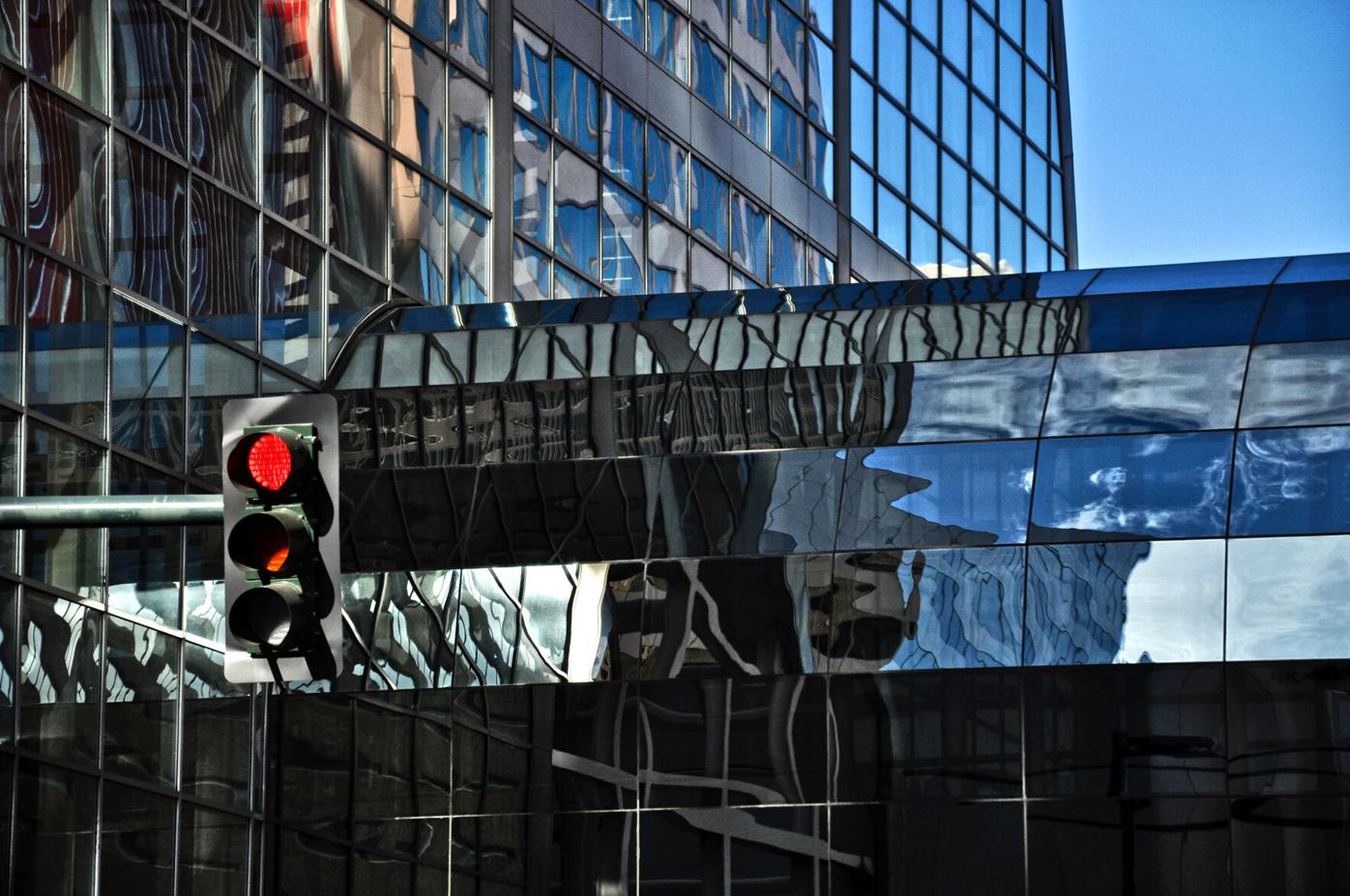 Red Light and urban Denver skyscrapers