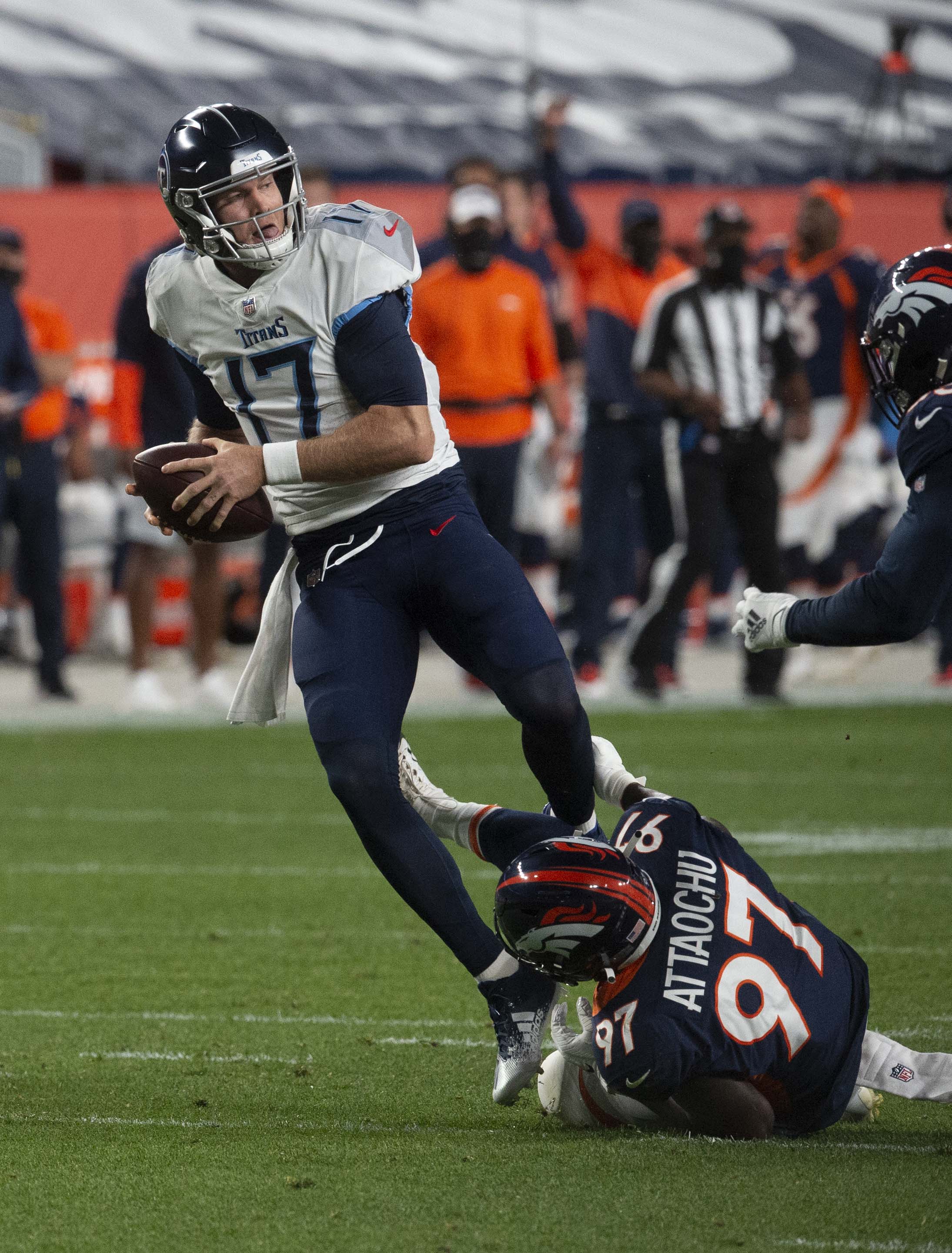 Denver Broncos linebacker Jeremiah Attaochu (97) pressures Tennessee Titans quarterback Ryan Tannehill (17) during the first quarter Monday, Sept. 14, 2020, at Empower Field at Mile High in Denver. (The Gazette, Christian Murdock) (Christian Murdock/The Gazette)