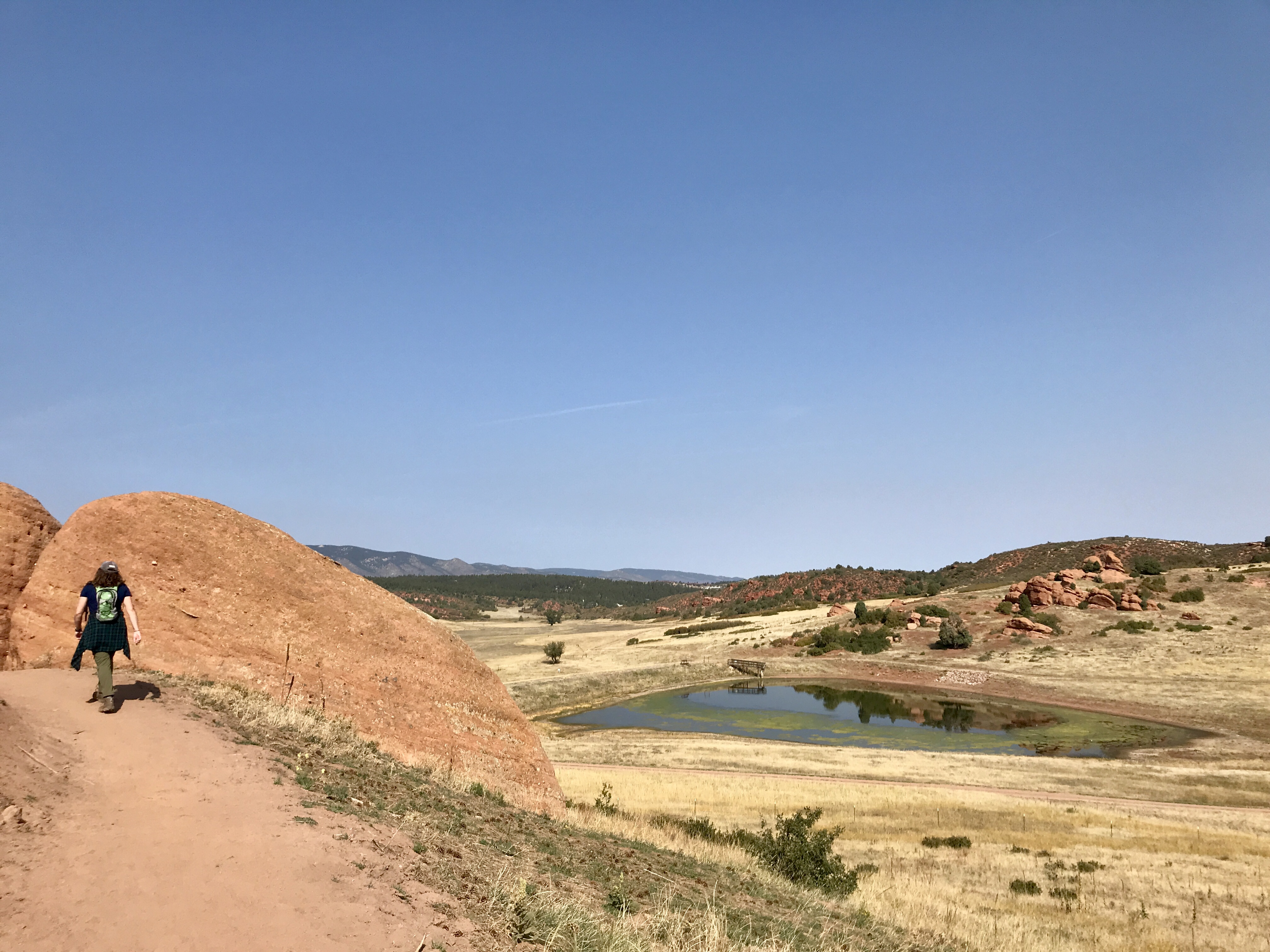 Seth Boster/The GazetteA hiker follows the Sandstone Meadow loop trail to a ridge overlooking the Sandstone Ranch, the new Douglas County open space. (Seth Boster, The Gazette)