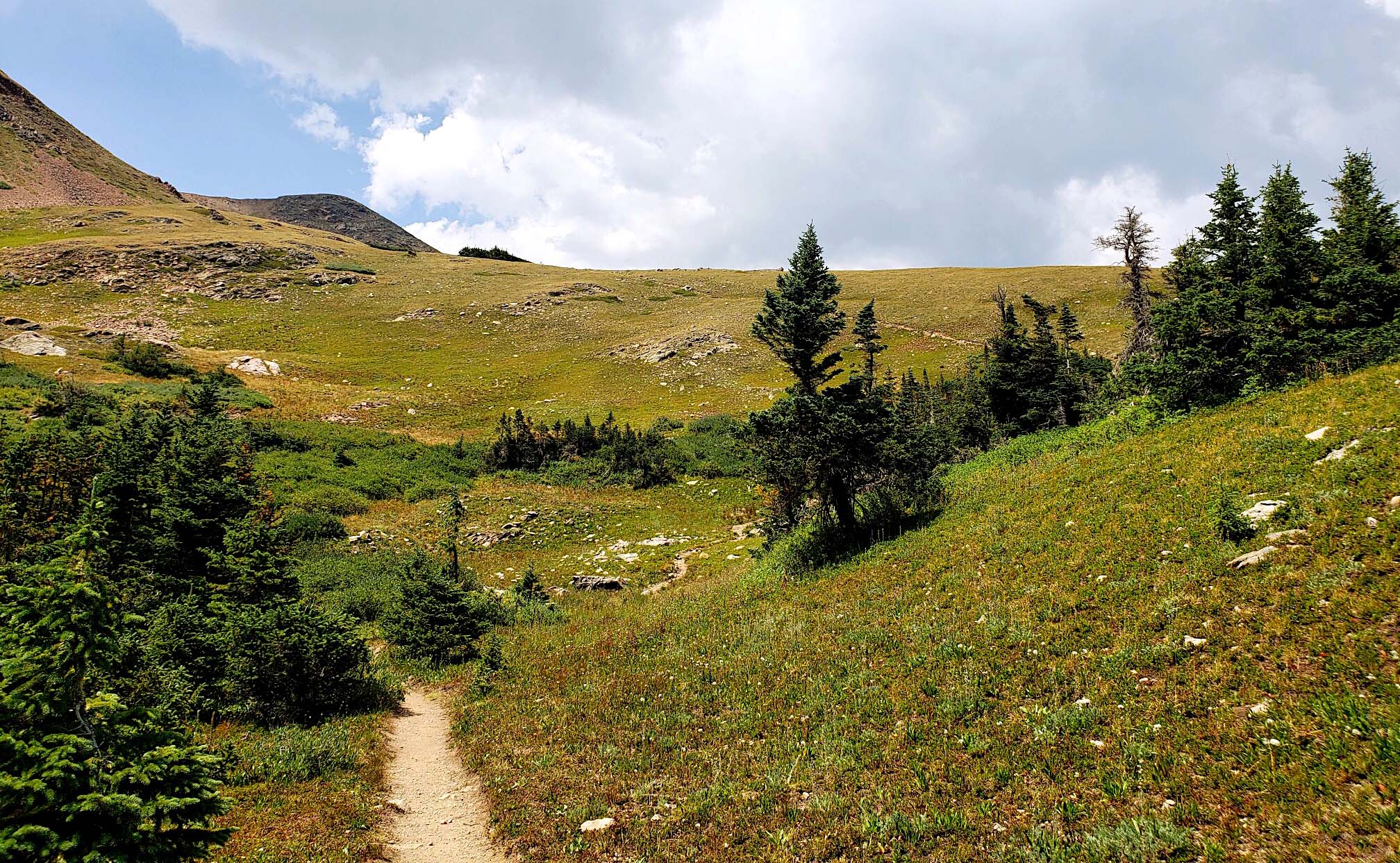 A trail skirts the tundra of James Peak Wilderness in central Colorado. The area is named for Edwin James, who in 1820 was the first to record a climb of Pikes Peak. (photos by Breanna Sneeringer, Out There Colorado)