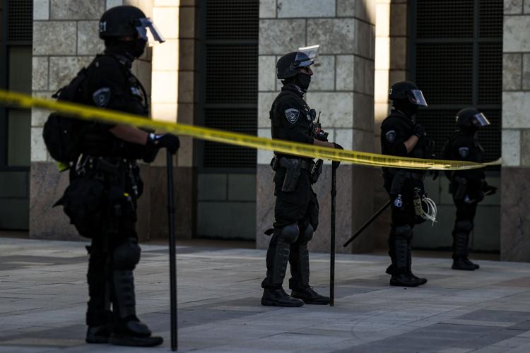 After fatal shooting, long legal battle, security company Pinkerton can operate in Denver again