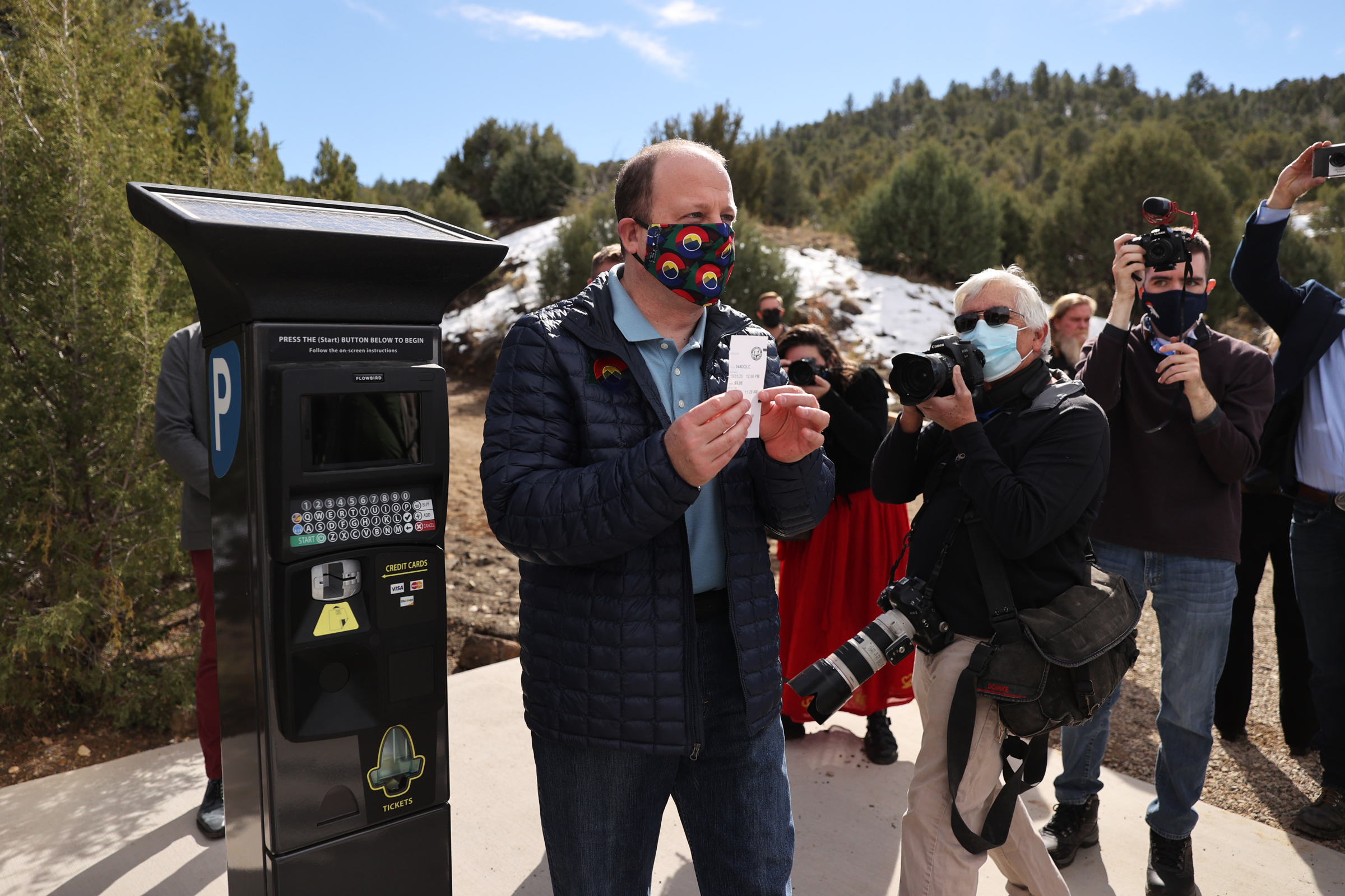 Colorado Governor Jared Polis shows off the very first admission pass at the grand opening of Fishers Peak State Park near Trinidad, Colorado on Oct. 30, 2020. Fishers Peak is the 42nd state park in Colorado, and is also one of the largest at over 19,000 acres in size. (Forrest Czarnecki/The Gazette) (Forrest Czarnecki)