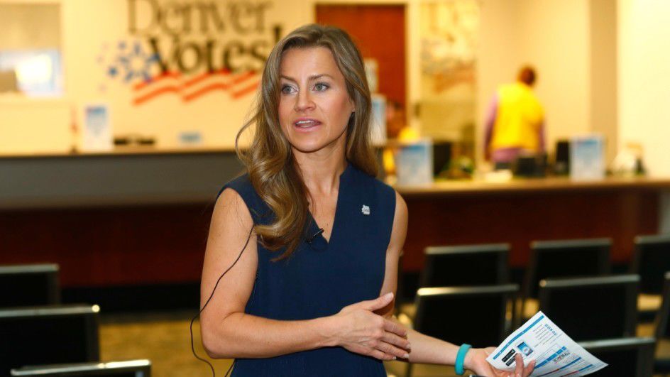 Amber McReynolds, then director of elections for the City and County of Denver, talks during a media tour of the Denver Elections Division headquarters Oct. 28, 2016. (AP Photo/David Zalubowski, file)