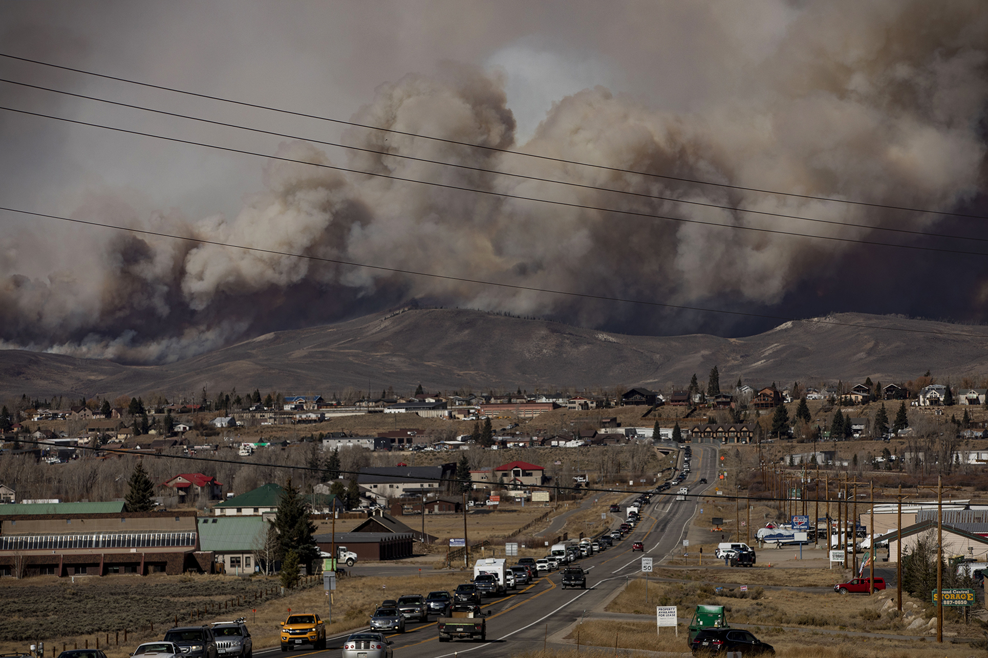 A line of cars leaving the town of Granby as the East Troublesome fire burns in Grand County on Thursday, Oct. 22, 2020. The East Troublesome fire has grown to be the second-largest wildfire in Colorado history. (Chancey Bush/ The Gazette) (Chancey Bush The Gazette)