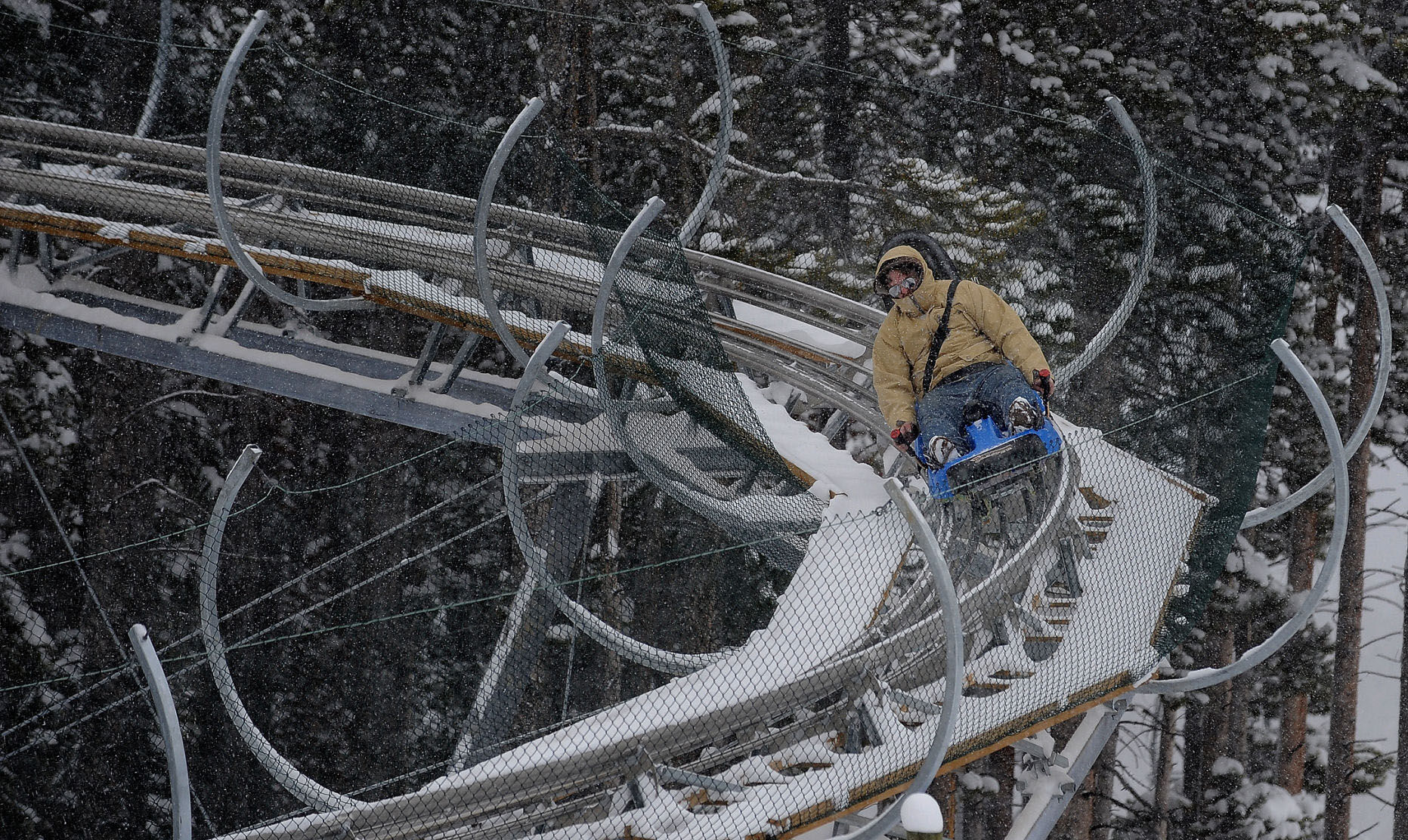 A rider flies through one of two corkscrews on the new Gold Runner Coaster at Breckenridge Ski Resort Tuesday, Nov. 16, 2010. The Coaster, located at the base of Peak 8, opened this year and runs everyday from noon to 4:30 p.m. (The Gazette, Christian Murdock)
