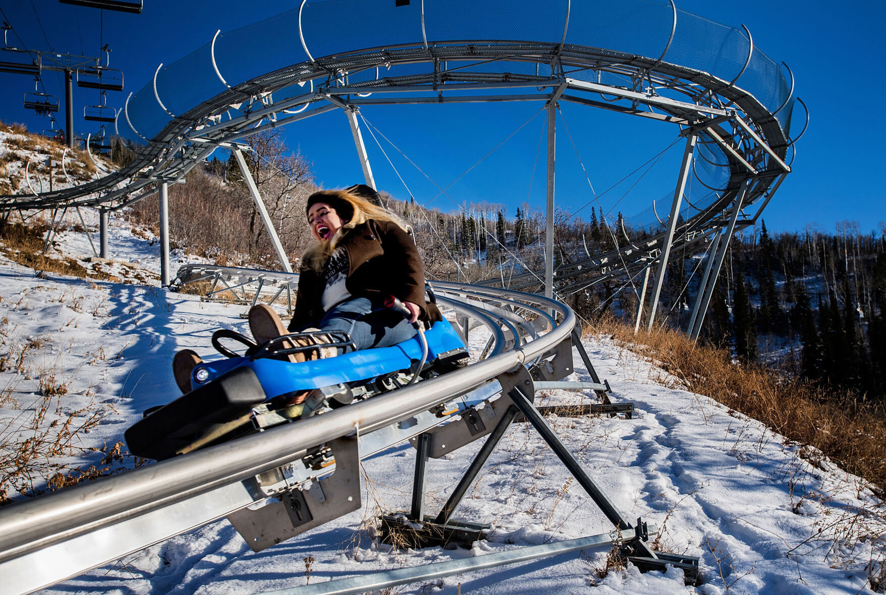 Christian Murdock/The GazetteA rider flies down the 6,280-foot long Outlaw Mountain Coaster on Dec. 9, 2017, at Steamboat Resort. The new ride next to the Christie Peak Express is the longest hillside coaster in North America.