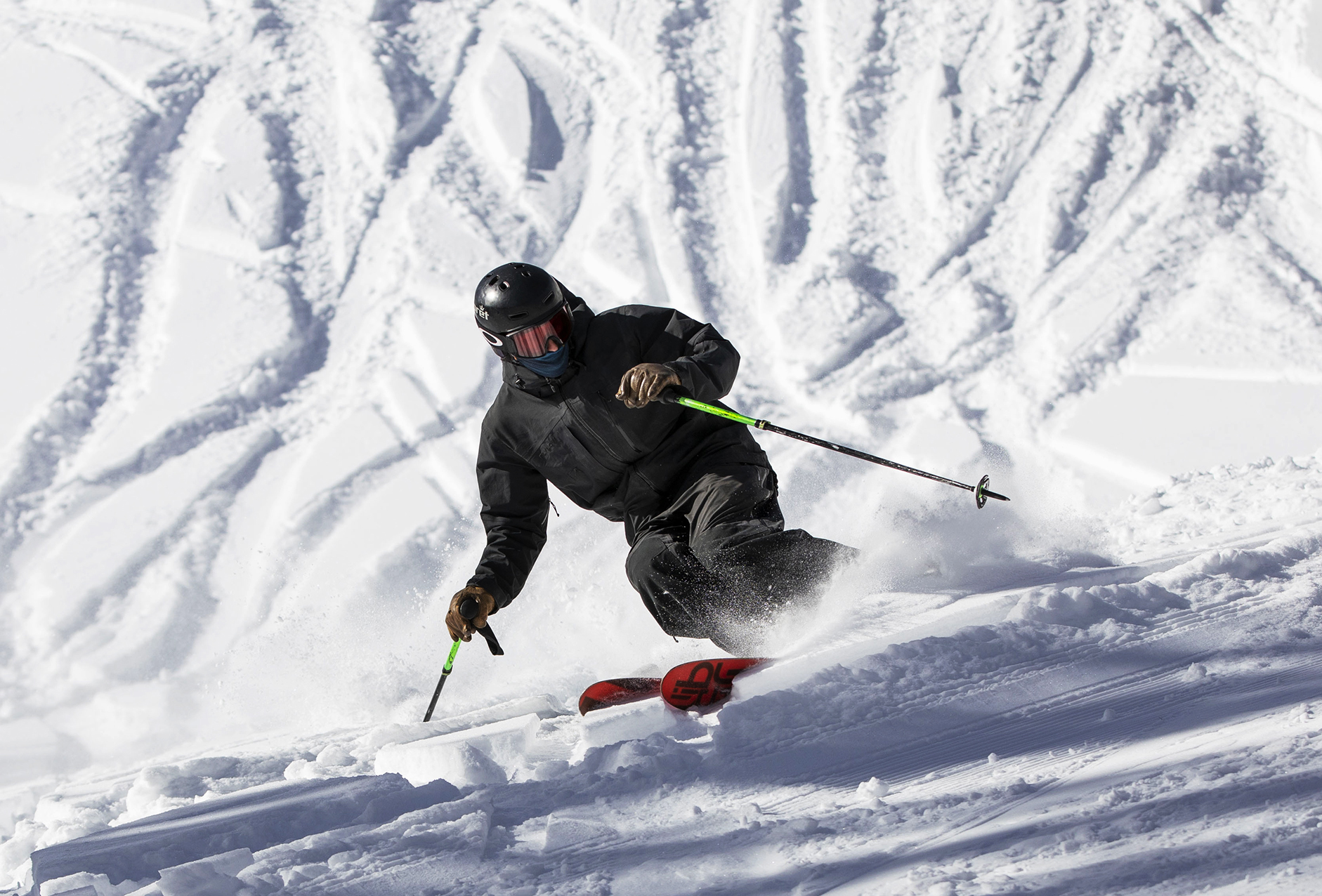 A skier cuts down past the Bonanza Trail at Wolf Creek Ski Area in Colorado on Wednesday, Oct. 28, 2020. Wolf Creek is the first ski area in Colorado to open for the 2020-21 season, with a snow total of 24 inches. Treasure, Bonanza and Nova lifts are in full operation. Due to COVID-19, all indoor facilities are closed, excluding bathrooms, social distancing and wearing of masks are required. (Chancey Bush/ The Gazette) (Chancey Bush The Gazette)