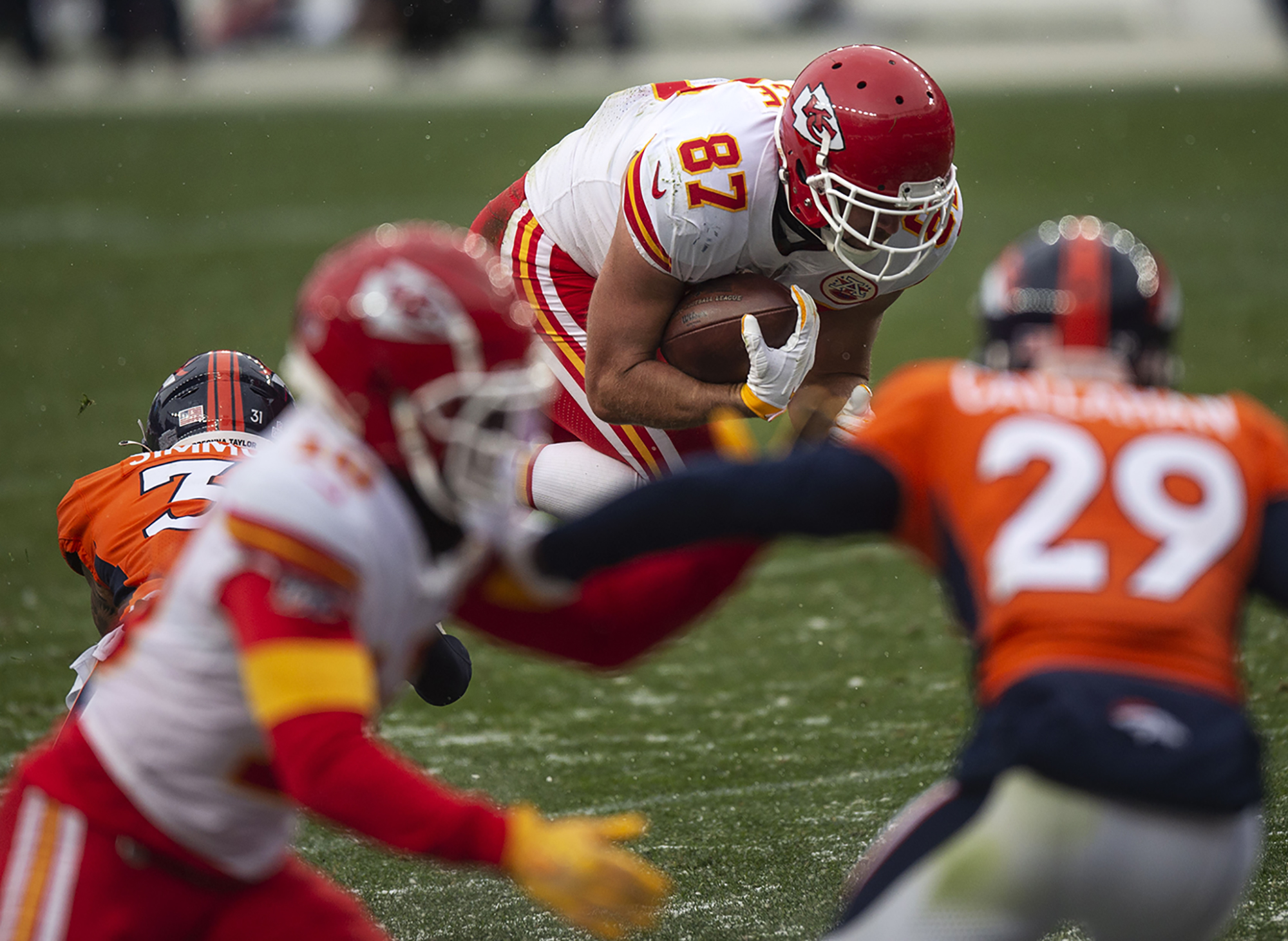 Kansas City Chiefs tight end Travis Kelce (87) carries the ball during the Denver Broncos home game against the Kansas City Chiefs at Empower Field at Mile High in Denver, Colo., on Sunday, Oct. 25, 2020. The Broncos lost to the Chiefs by a score of 43-16.(Chancey Bush/ The Gazette) (ChristianMurdock)