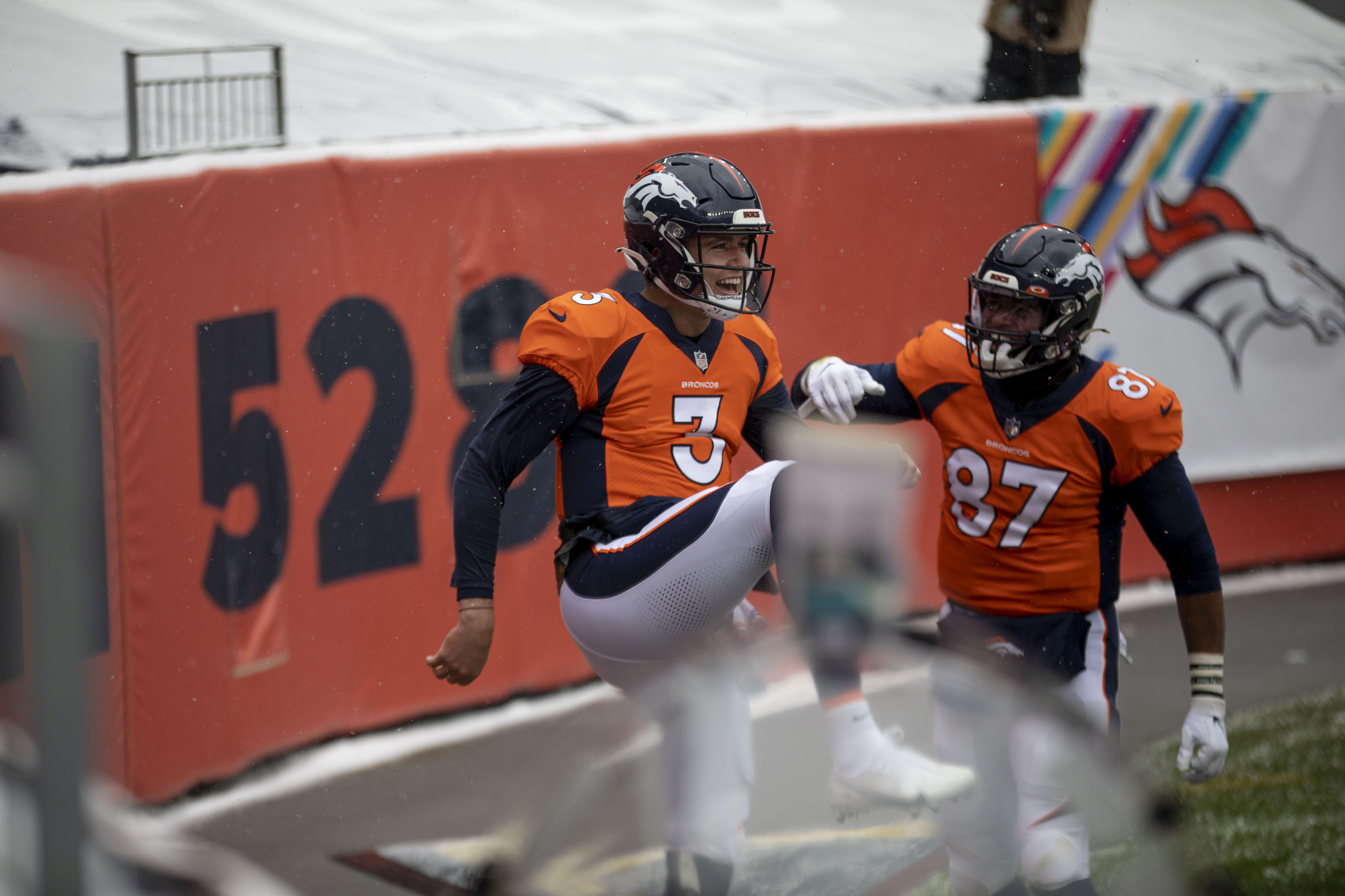 Denver Broncos quarterback Drew Lock (3) celebrates after scoring a touchdown with Denver Broncos tight end Noah Fant (87) during the Denver Broncos home game against the Kansas City Chiefs at Empower Field at Mile High in Denver, Colo., on Sunday, Oct. 25, 2020. The Broncos lost to the Chiefs by a score of 43-16.(Chancey Bush/ The Gazette) (Chancey Bush The Gazette)