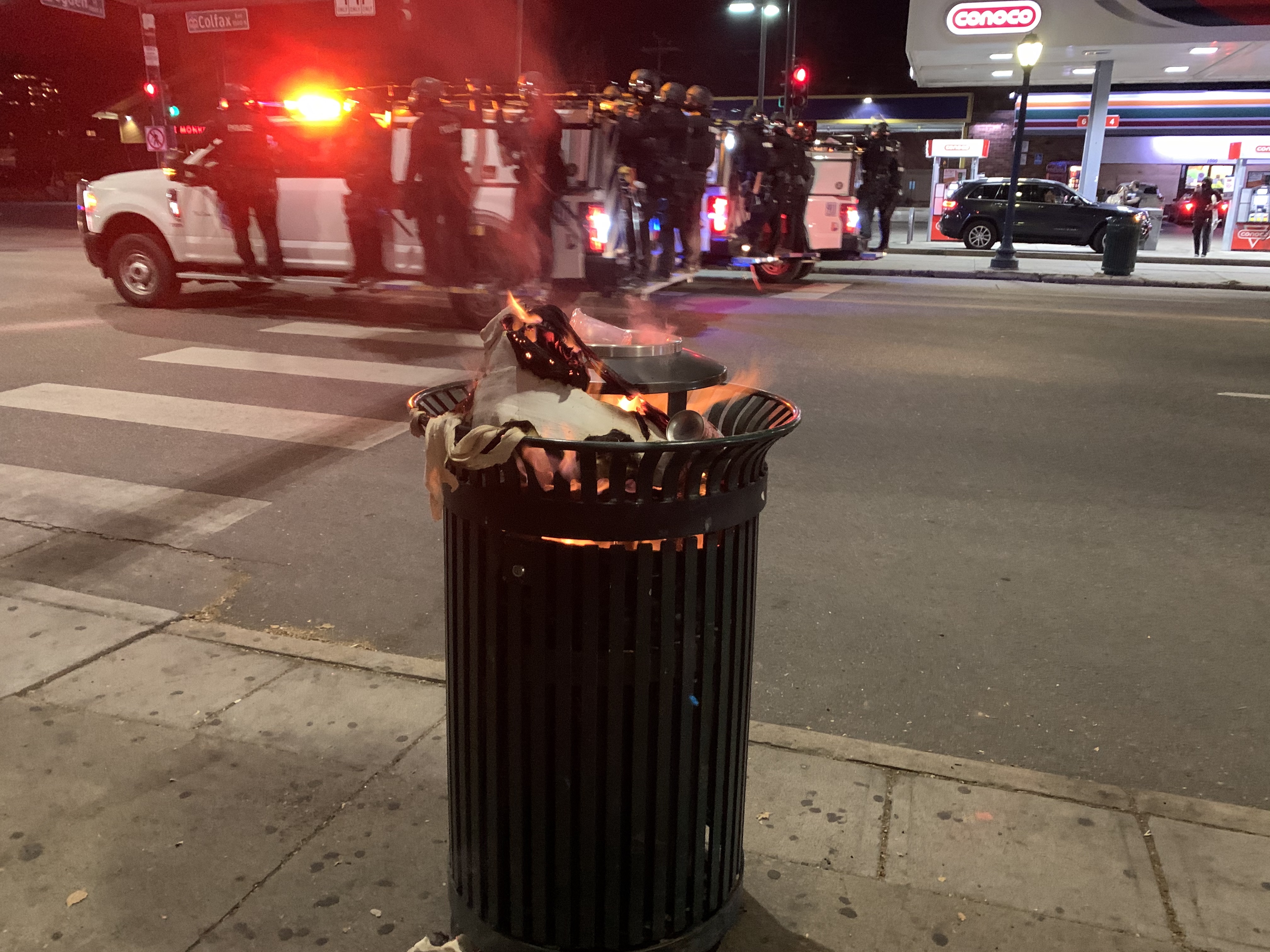 Protestors started fires in corner trash bins along Colfax Avenue Wednesday evening. (DavidMullenBreaking News Reporterdavid.mullen@gazette.comhttps://secure.gravatar.com/avatar/349fcb3ec304c9bbf2b50a05578938e7?d=mm&r=g)