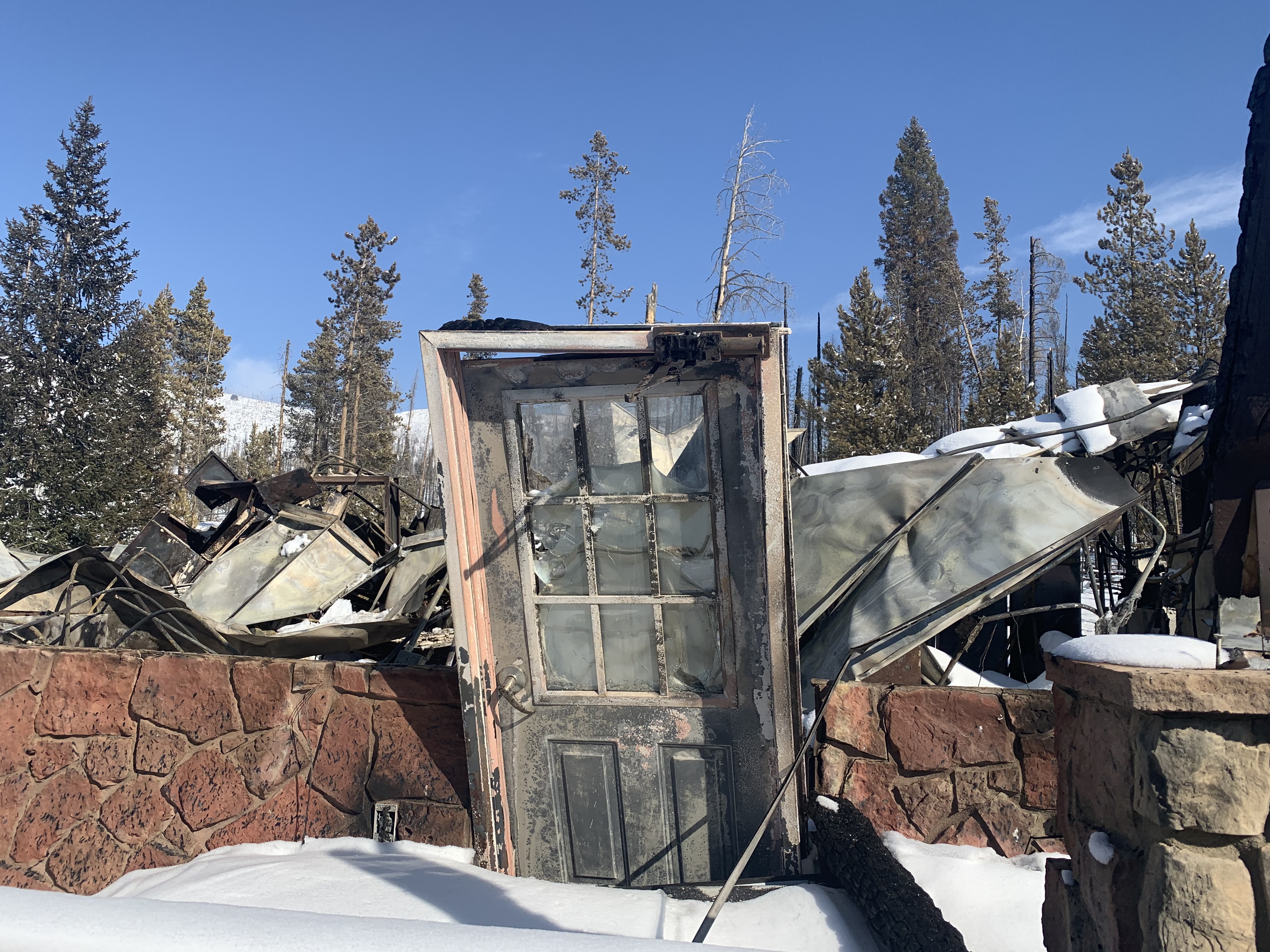 A door remains after the East Troublesome Fire destroyed the Grand Lake Entrance Station Office in Rocky Mountain National Park. (Courtesy National Park Service)