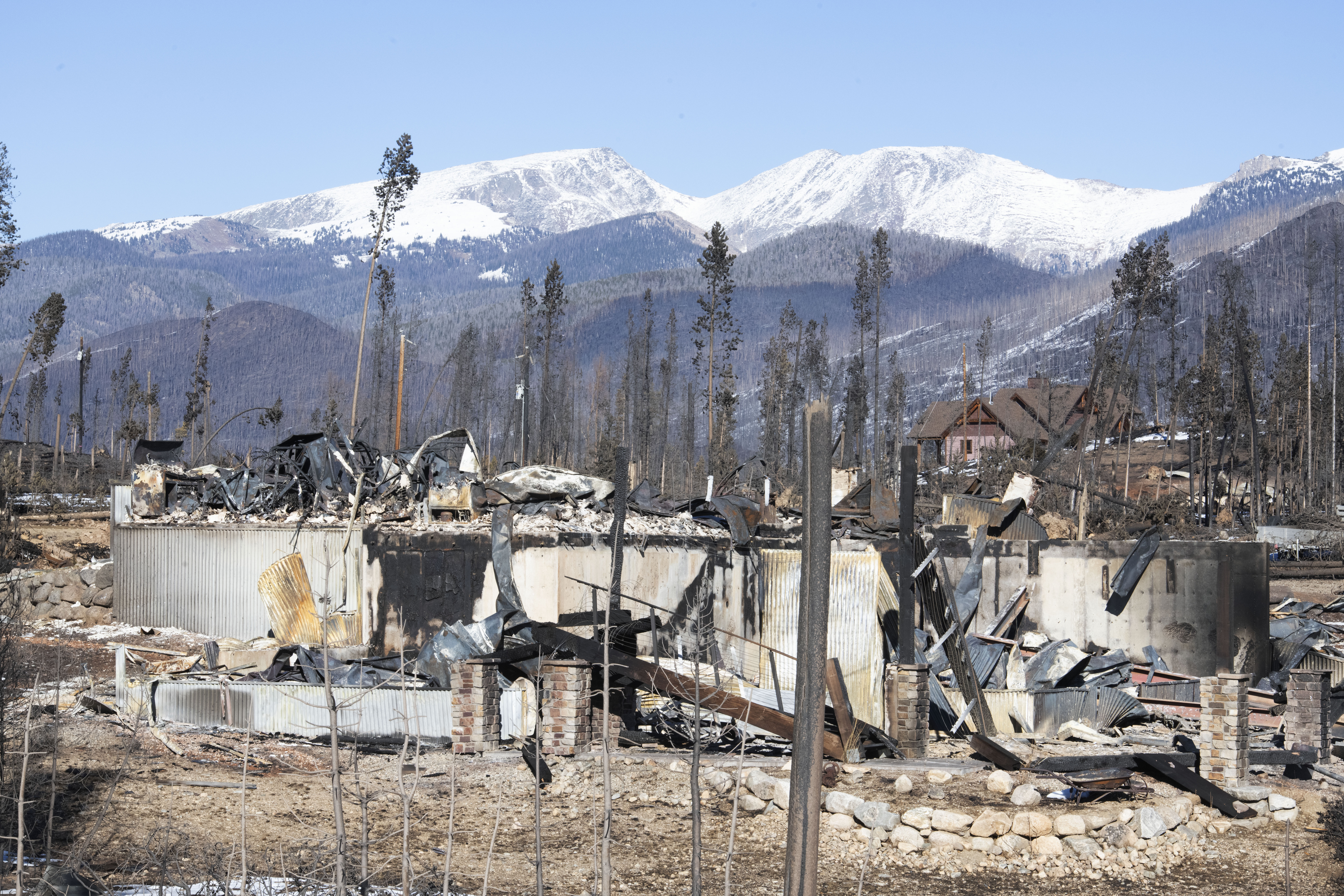 A stone chimney and some rubble is all that’s left of a home in the Sun Valley subdivision near Grand Lake, Colorado on Sunday, Nov. 1, 2020. The East Troublesome Fire was substantially slowed down last week after quickly becoming on of the largest wildfires in Colorado history overnight. (Photo by Jerilee Bennett, The Gazette) (JERILEE BENNETT, THE GAZETTE)