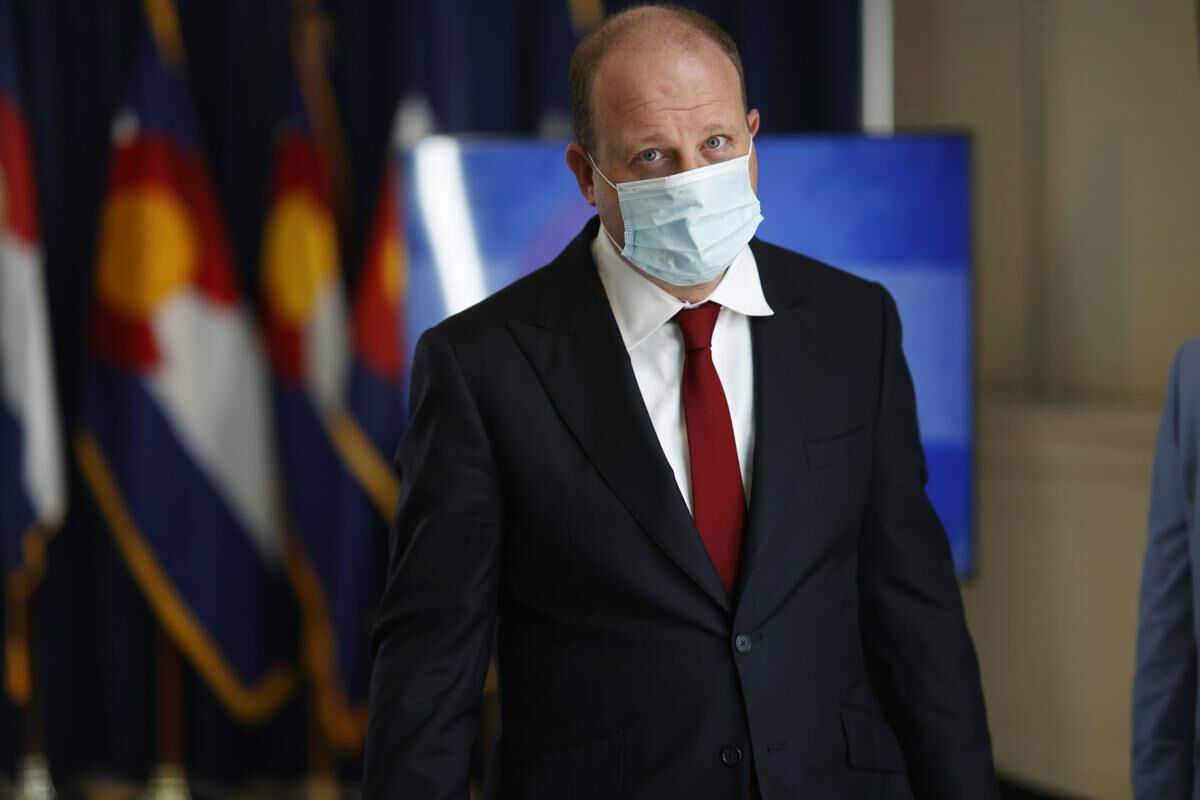 Polis extends Colorado’s mask mandate