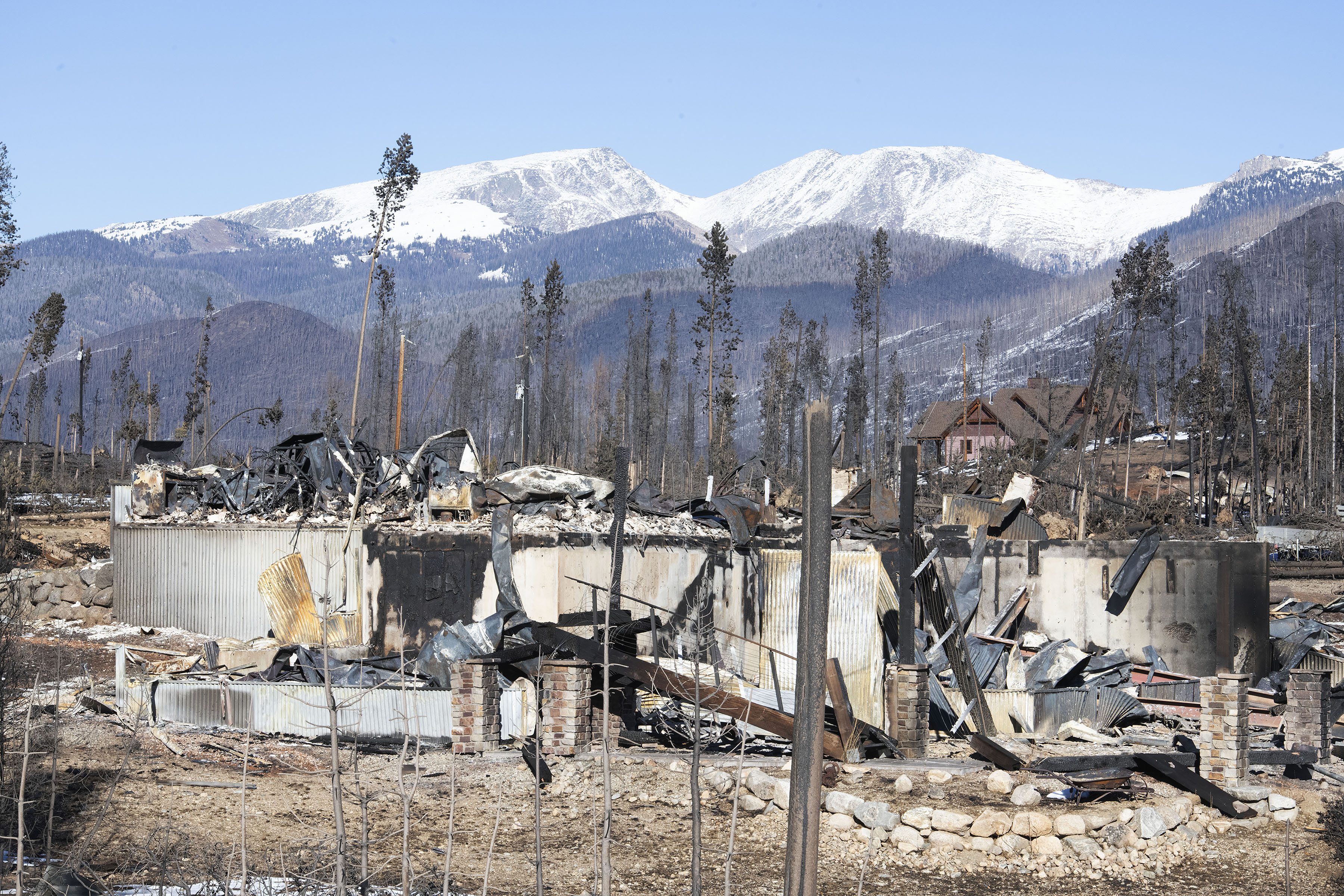 A stone chimney and some rubble is all that’s left of a home in the Sun Valley subdivision near Grand Lake, Colorado on Sunday, Nov. 1, 2020. The East Troublesome Fire was substantially slowed down last week after quickly becoming on of the largest wildfires in Colorado history overnight. (Photo by Jerilee Bennett, The Gazette) (JERILEE BENNETT, THE GAZETTE)