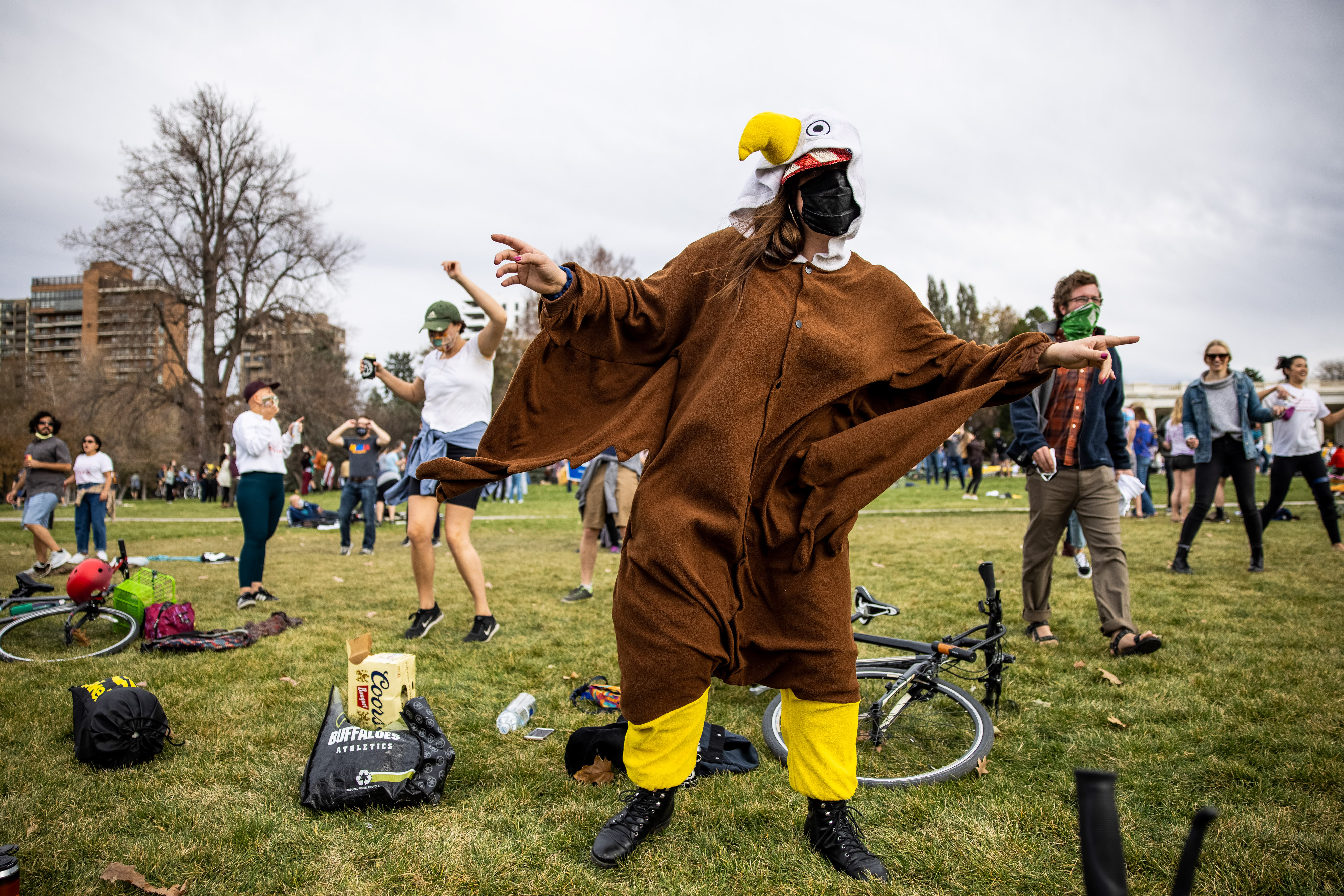 Dressed as an eagle, Taylor Soderborg dances as people celebrate the announcement that Joe Biden was elected as the next president of the United States according to multiple news sources Saturday, Nov. 7, 2020 at Cheeseman Park in Denver. (Michael Ciaglo/Special to The Denver Gazette) (Michael Ciaglo/Special to The De)