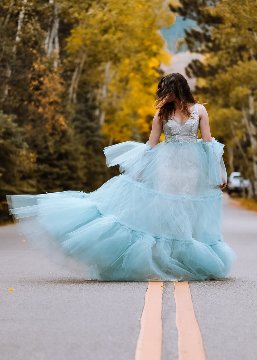 AnaKacia Shifflet’s wedding dresses are customizable. Most of them are two pieces, including the overlay, which can be removed.