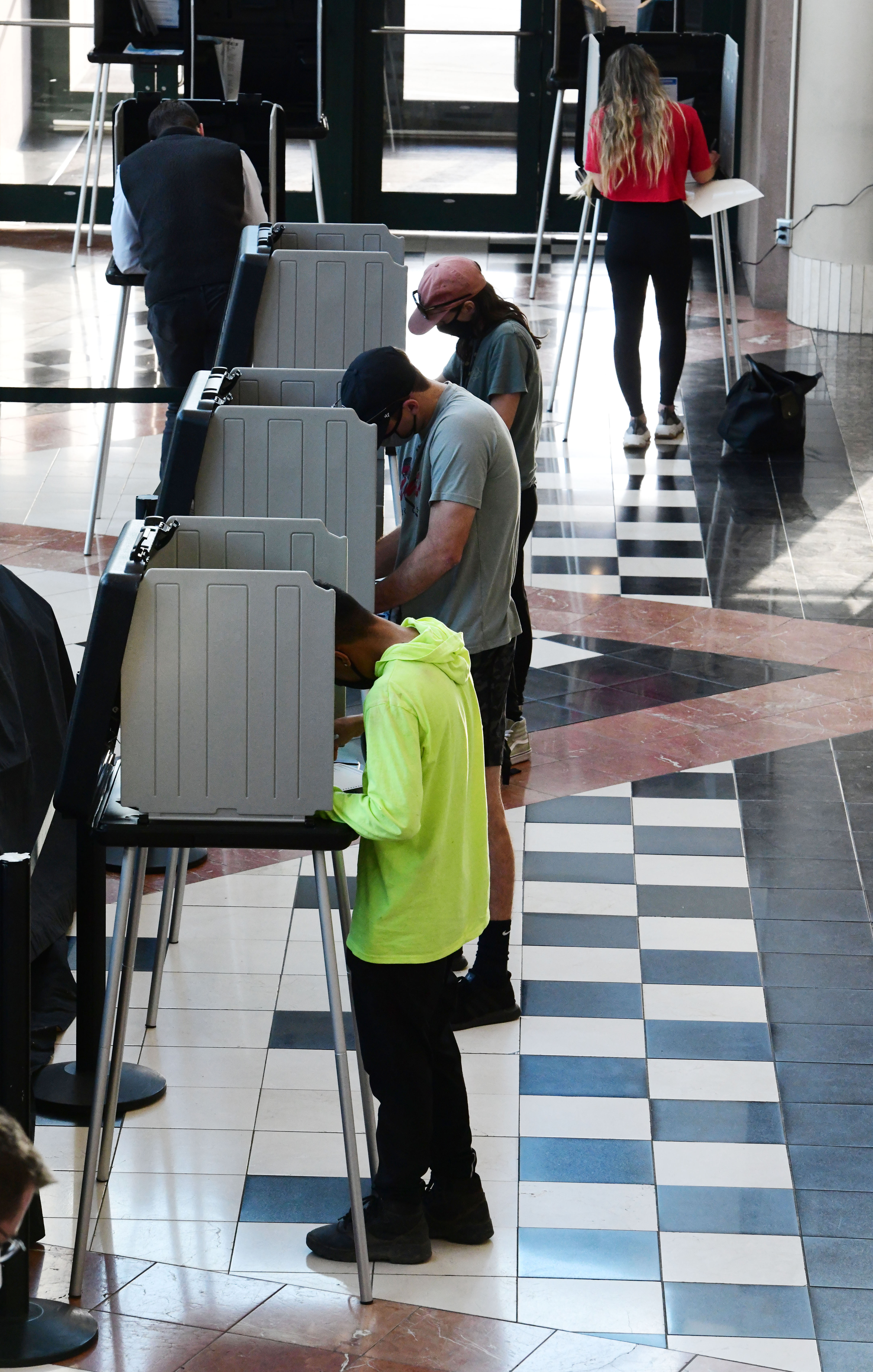 Voting was brisk at the Ball Arena (formerly known as the Pepsi Center) on Election Day in Denver on Tuesday, Nov. 3. 2020. (Photo by Jerilee Bennett, The Gazette) (JERILEE BENNETT, THE GAZETTE)