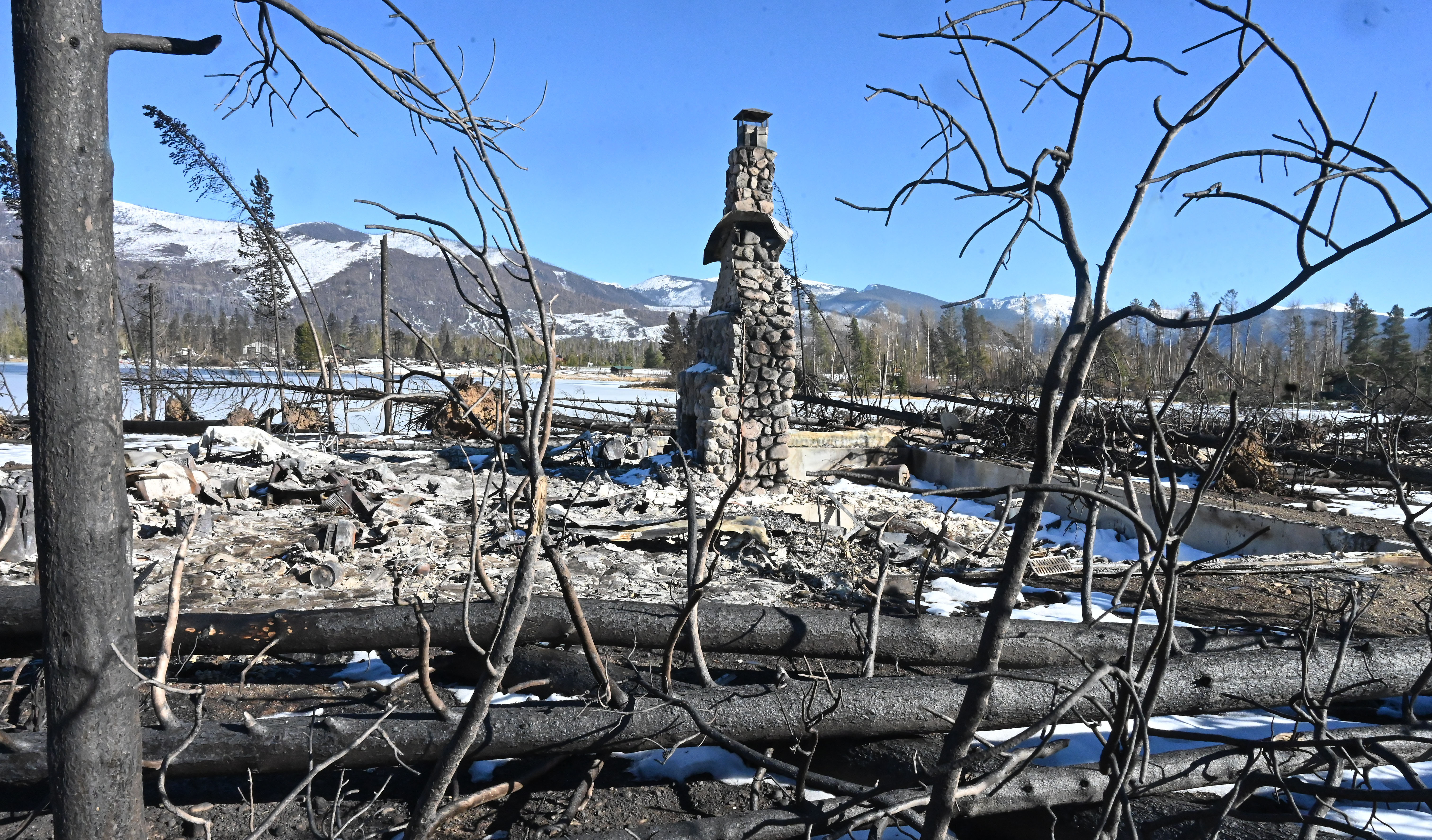 A stone chimney and some rubble is all that’s left of a home in the Sun Valley subdivision near Grand Lake, Colorado on Sunday, Nov. 1, 2020. The East Troublesome Fire was substantially slowed down last week after quickly becoming on of the largest wildfires in Colorado history overnight. (Photo by Jerilee Bennett, The Gazette) (JERILEE BENNETT THE GAZETTE)