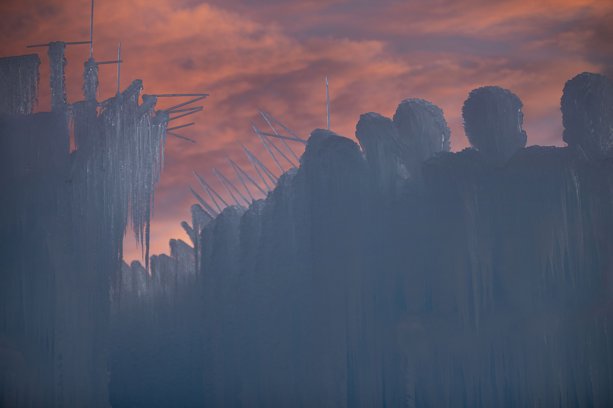 The Dillon Ice Castles are taking shape in Dillon, Colo., on Wednesday, Dec. 9, 2020. Ice artisans spend around six weeks placing up to 10,000 icicles each day to create the life-size winter fairytale built entirely from ice.The Ice Castles return for the fourth year with limited capacity due to the COVID-19 pandemic. The Ice Castles are expected to open around Christmas. (Chancey Bush/ The Gazette) (Chancey Bush/ The Gazette)