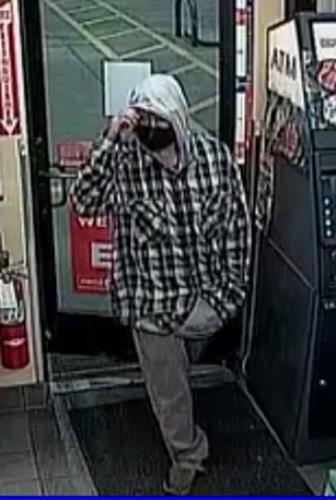 Law enforcement officials apprehend suspect accused of robbing and slaying Centennial gas station clerk