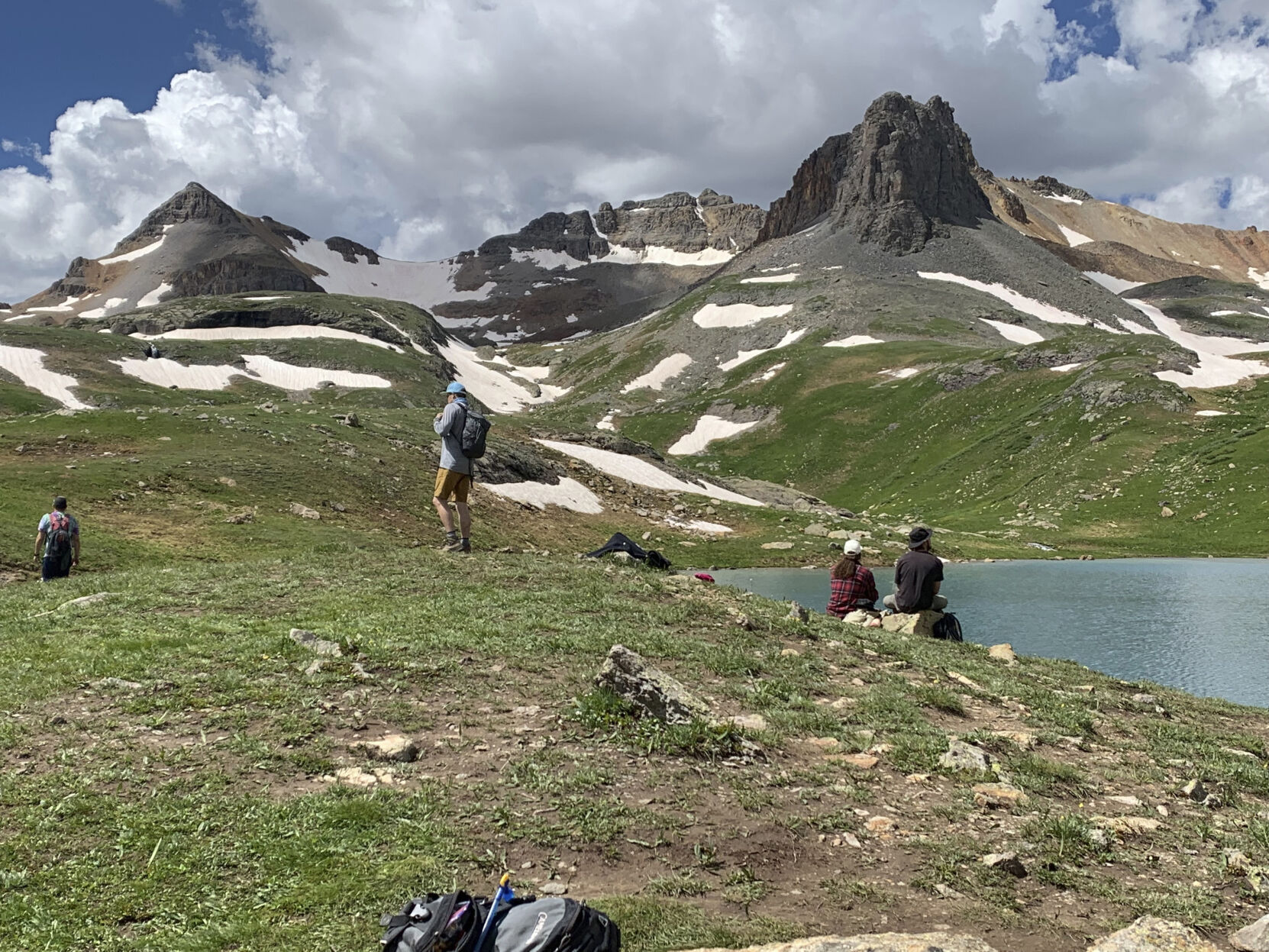Visitors look over Ice Lake at 12,300 feet in the San Juan Range just west of Silverton. Forest service officials are considering a permit system to access the spectacular Ice Lakes area. (THE ASSOCIATED PRESS)