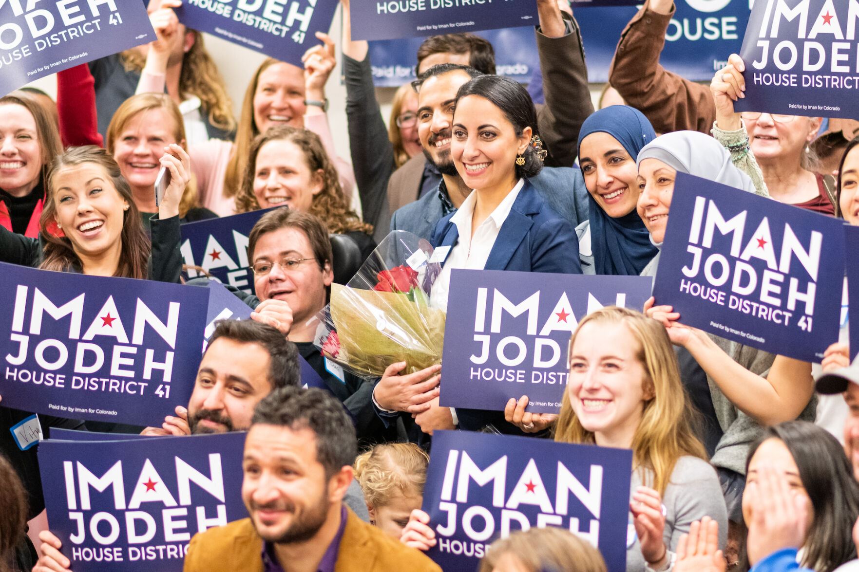 Surrounded by family and supporters, Iman Jodeh poses for a group picture during the launch event for her Democratic primary campaign for Colorado House District 41 at the 2nd Home Adult Day Service Center in Aurora on Jan. 21, 2020. (JoeyBunchjoey.bunch@coloradopolitics.comhttps://secure.gravatar.com/avatar/66505e98f9e3fed10e6a3b9a1fc4ca22?d=mm&r=g)