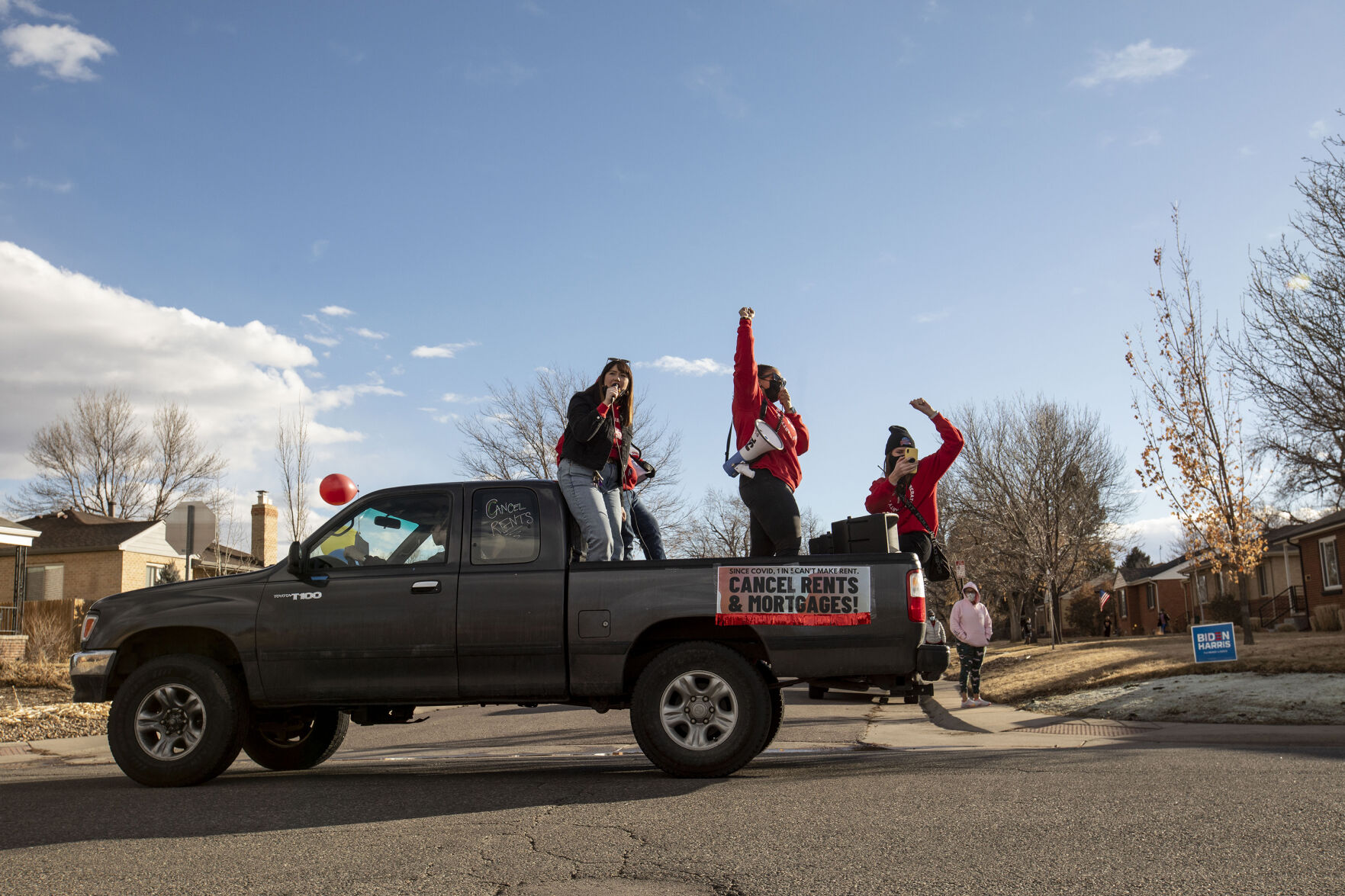 The Denver chapter of the Party for Socialism and Liberation and 9to5 Colorado hold a ‘Cancel the Rent’ car protest as vehicles make their way down 29th Avenue in Denver, Colo., on Saturday, Jan. 30, 2021. The protest was a national day of action with 30 planned for this weekend by PSL chapters in cities around the U.S to ask for government intervention to head off a worsening housing crisis. The concern over eviction moratoriums expiring in April will mean a renewed wave of evictions for residents in Colorado. 