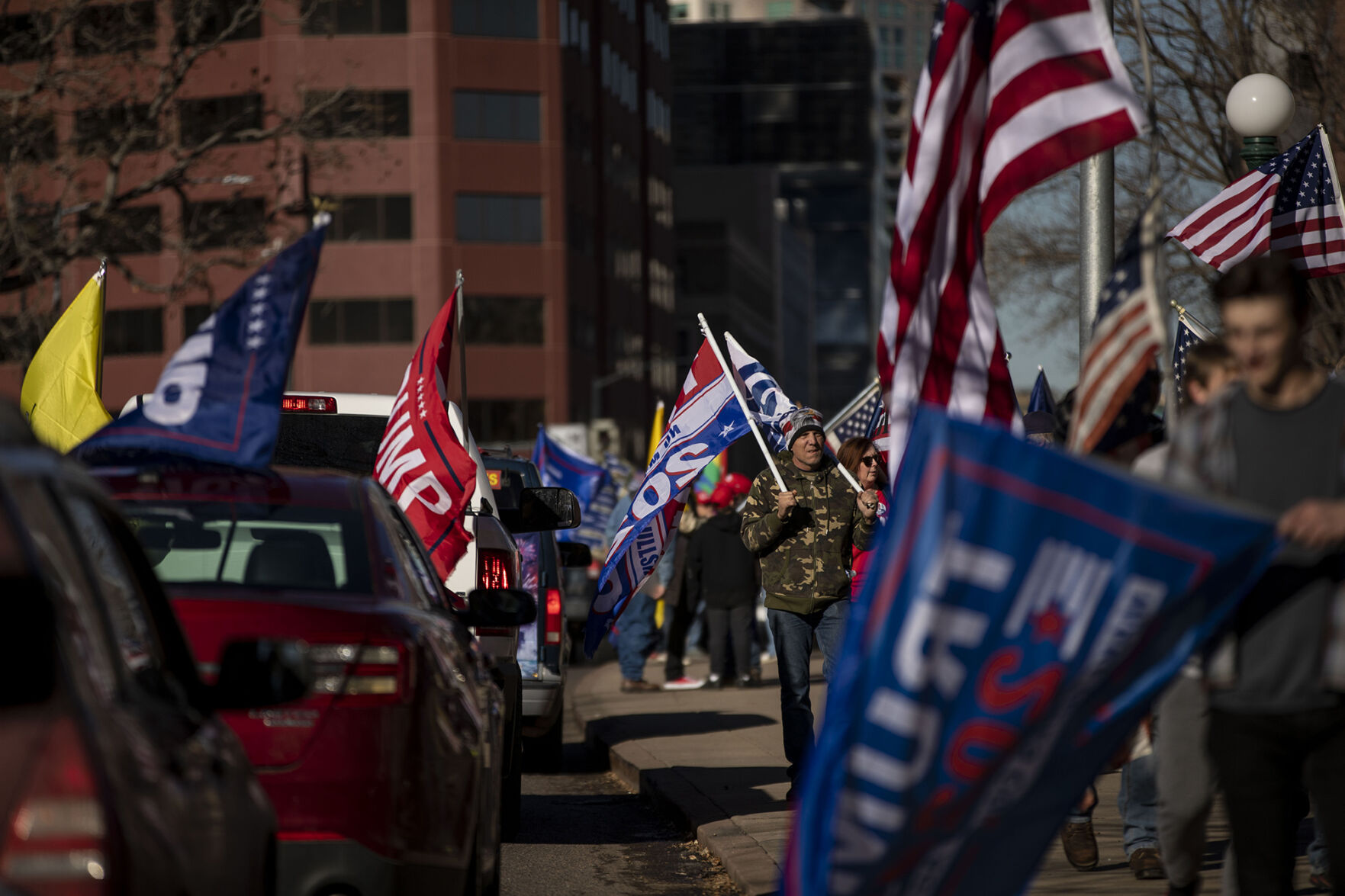 Protesters wave flags during the 