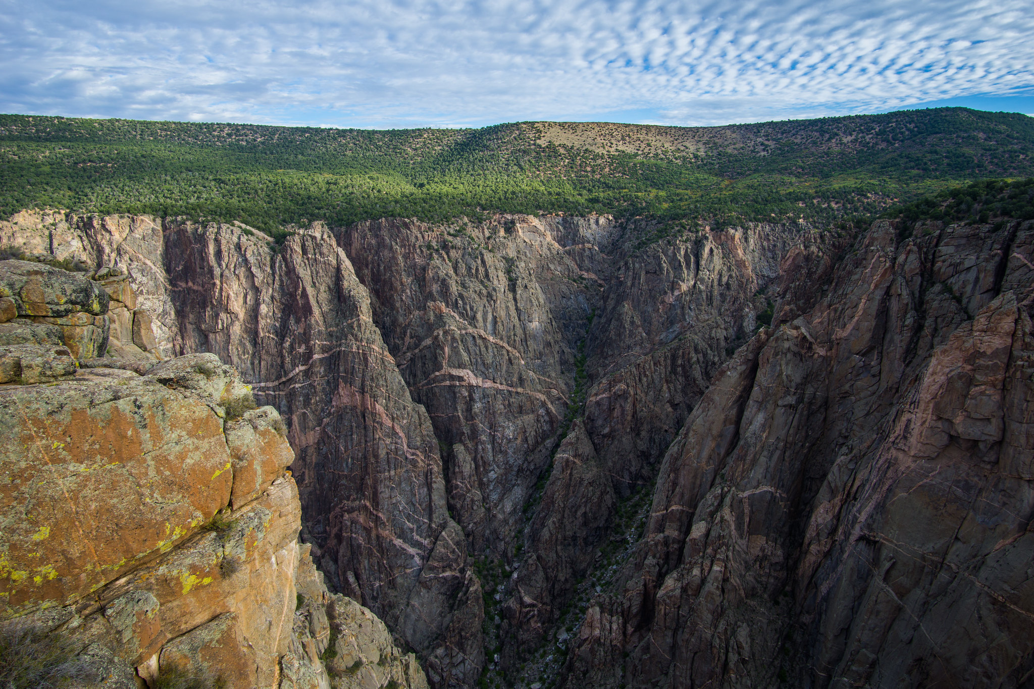 “The Song of the Gunnison”Those who have spent enough time at the Black Canyon of the Gunnison have noticed a common sound. Some say it’s a blend of wind, wings of soaring birds, and the rush of the water below that echo through the canyon walls. The bits of sound resonate from the depths of the canyon. Dubbed “The Song of the Gunnison”, it can be heard on a very quiet visit.Photo Credit: mcfst3 (Flickr)