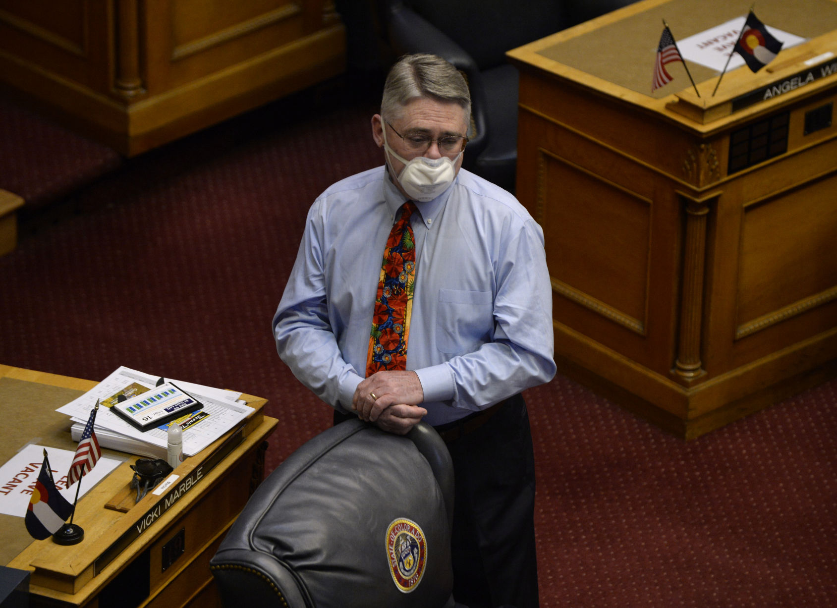 Senate Minority Leader Chris Holbert waits by his chair on the senate floor for the returning session to begin. Colorado lawmakers return to the state Capitol on May 26, 2020 in Denver, Colorado. Legislators have returned after a 10-week pause due to fears from the spread of the coronavirus. (Kathryn Scott, special to Colorado Politics)