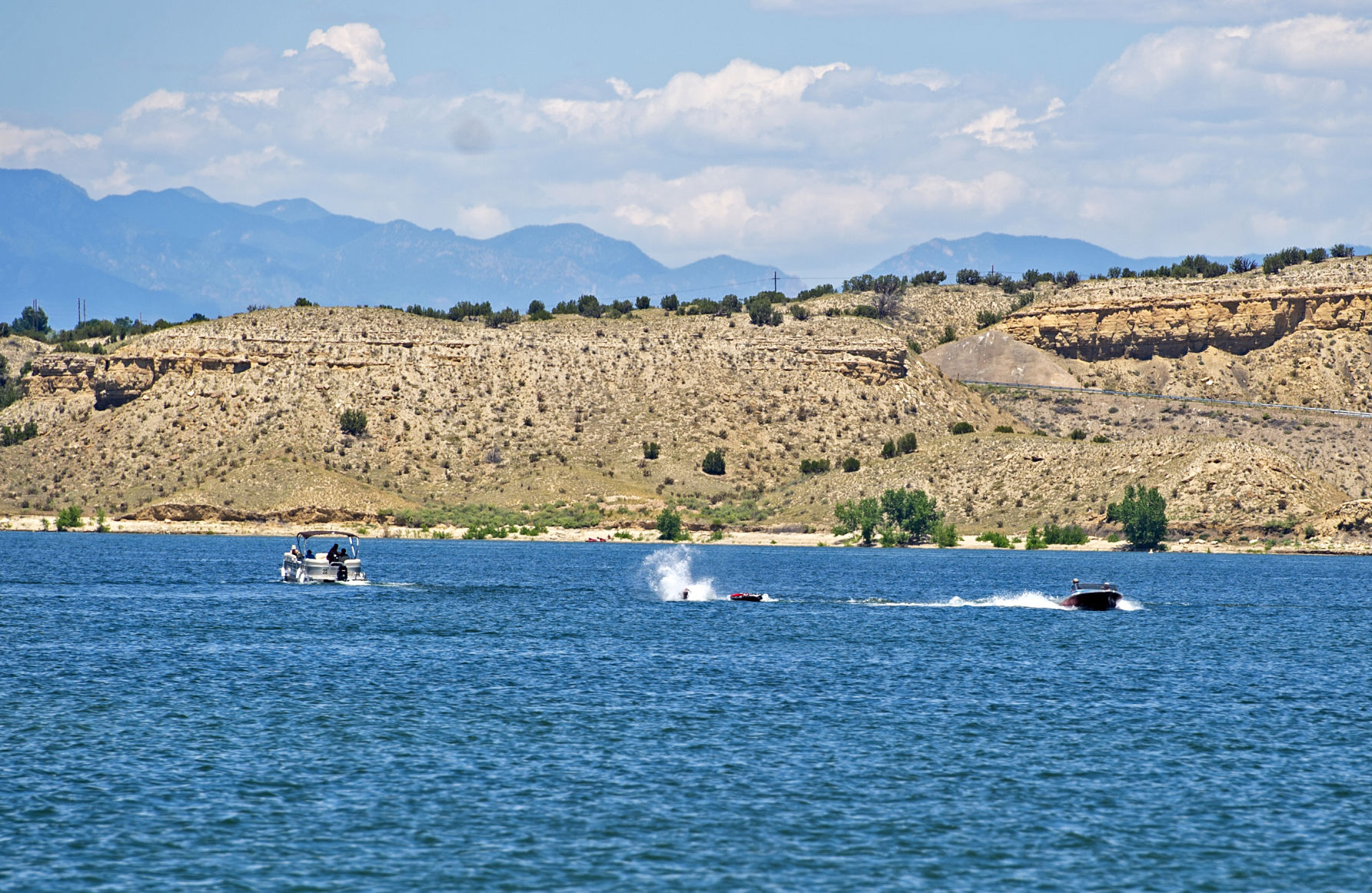 Boaters cruise and tube at Lake Pueblo State Park. (The Gazette file)
