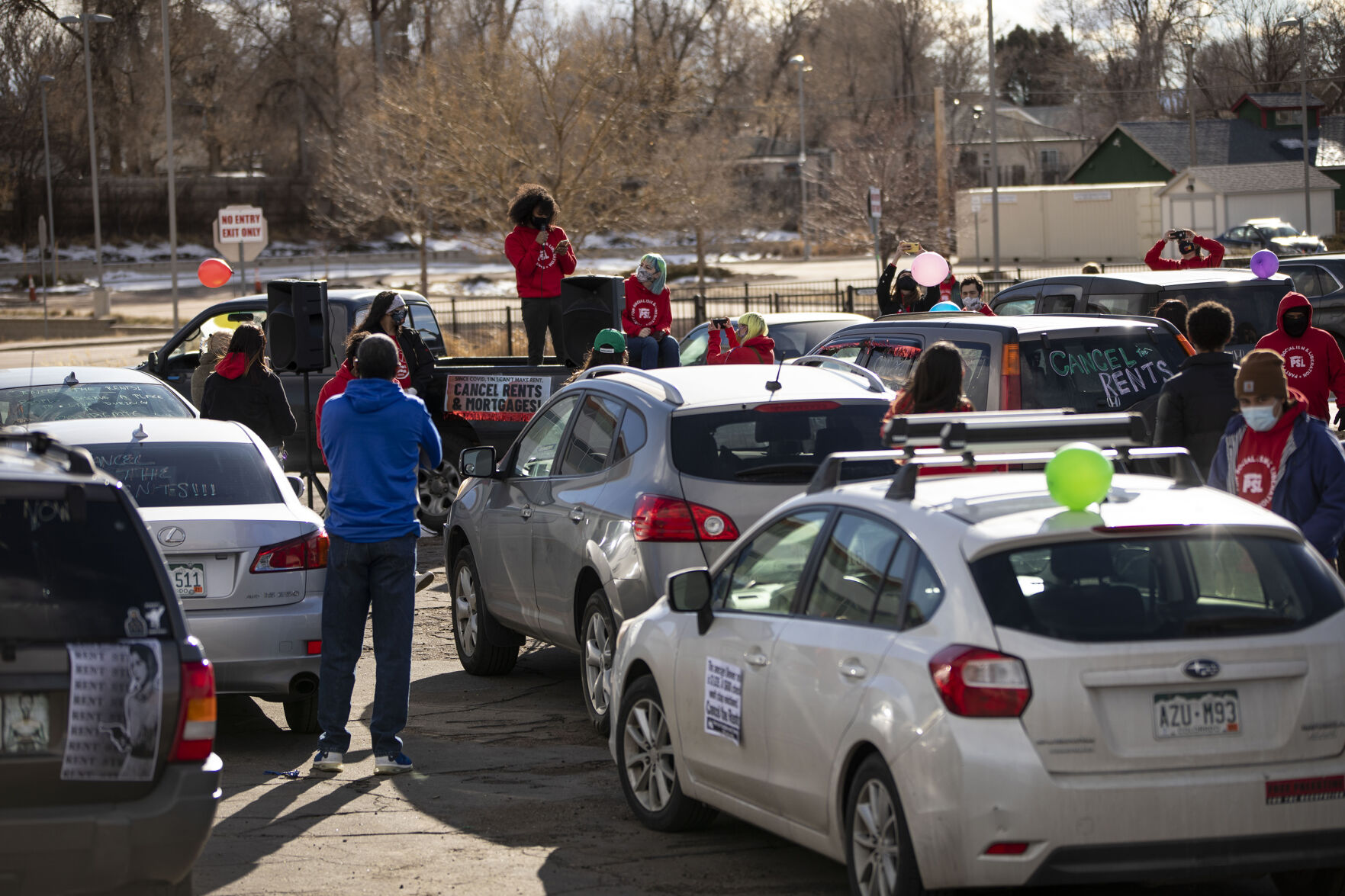 Yaphet Gessesse speaks during the Denver chapter of the Party for Socialism and Liberation and 9to5 Colorado hold a ‘Cancel the Rent’ car protest in Denver, Colo., on Saturday, Jan. 30, 2021. The protest was a national day of action with 30 planned for this weekend by PSL chapters in cities around the U.S to ask for government intervention to head off a worsening housing crisis. The concern over eviction moratoriums expiring in April will mean a renewed wave of evictions for residents in Colorado. 