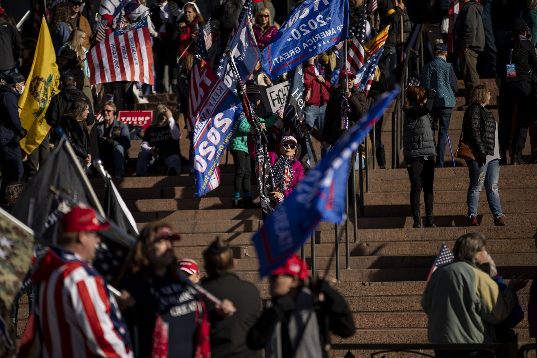 Protesters wave flags during the 