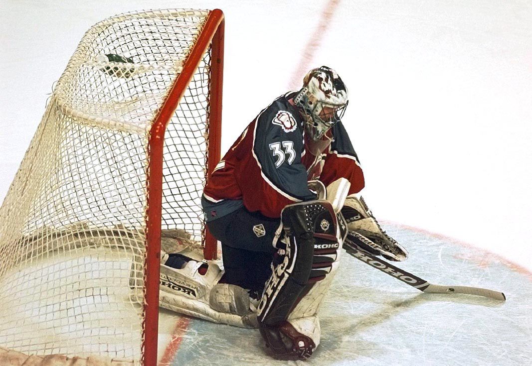 Colorado Avalanche goalie Patrick Roy kneels after giving up a goal to Bob Probert in the econd period Tuesday, April 22, 1997, in Chicago. The Blackhawks won 6-3. (AP Photo/Michael S. Green) (MICHAEL S. GREEN)