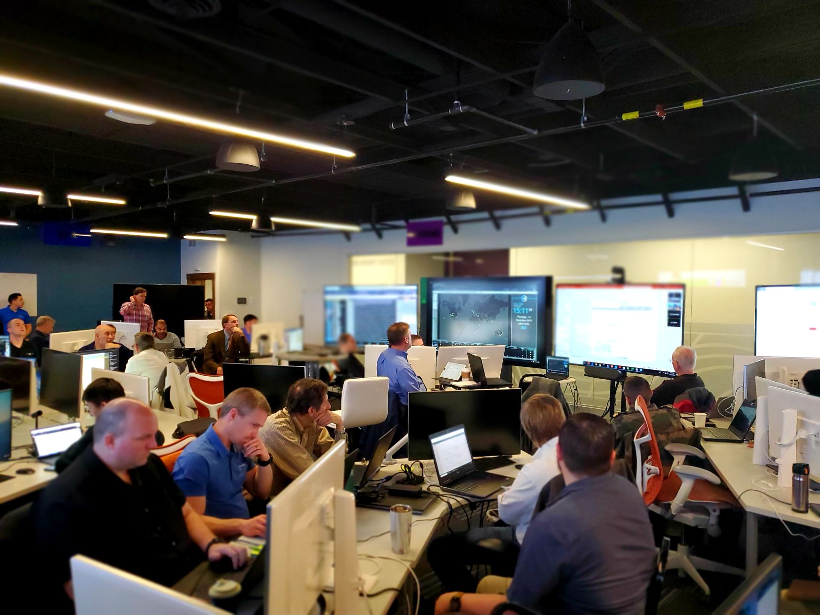 Members of the Colorado Springs, Catalyst Campus Commercial Space Operations Center transition exercise operations to the Australian team at the University of New South Wales, Canberra, Australia, during the Watch Hand-off. The December commercial Sprint Advanced Concept Training for Space Situational Awareness exercise allowed the Department of Commerce and Air Force to demonstrate around-the-clock daytime-only operations on three continents. (Courtesy Photo)