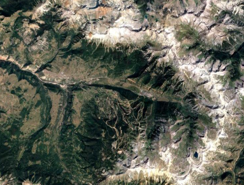 10. Telluride, ColoradoCentrally located in this image, it's easy to see why the southwestern town of Telluride is known for wraparound mountain views. This satellite image shows how a range literally circles the resort and town streets.Photo Credit: @2021 Google Maps.