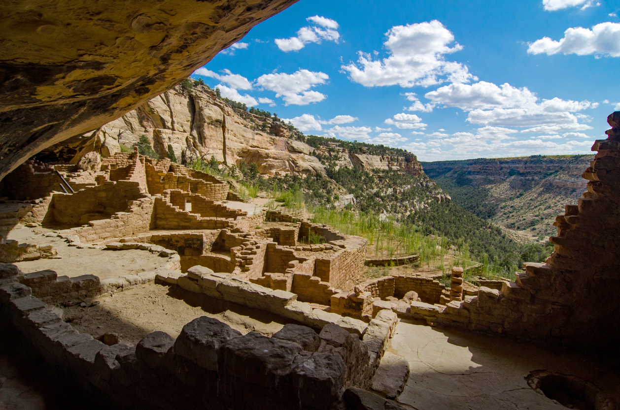2. History: Ancestral Pueblo People of Mesa VerdeA group of Ancestral Puebloans living in the Four Corners region approximately 1,400 years ago chose Mesa Verde for their home. The Ancestral Puebloans lived and thrived in the clay structures for more than 700 years, constructing the elaborate stone communities in the sheltered alcoves of the canyon walls. In the late A.D. 1200s, in the span of a generation or two, they left their homes and moved away.Photo Credit: scgerding (iStock).