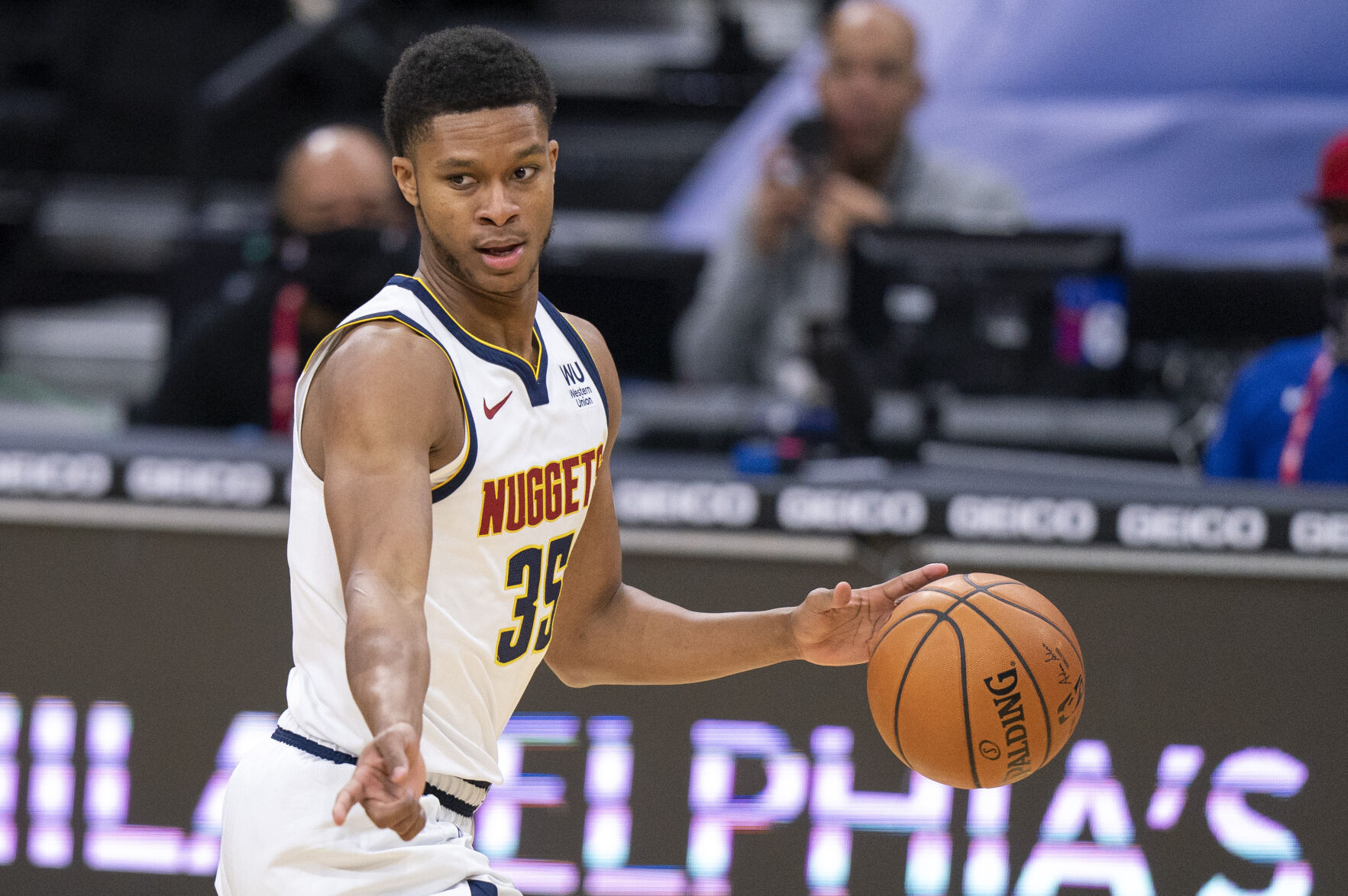 Denver Nuggets' PJ Dozier in action during the first half of an NBA basketball game against the Philadelphia 76ers, Saturday, Jan. 9, 2021, in Philadelphia. The Nuggets won 115-103. (AP Photo/Chris Szagola) (Chris Szagola)